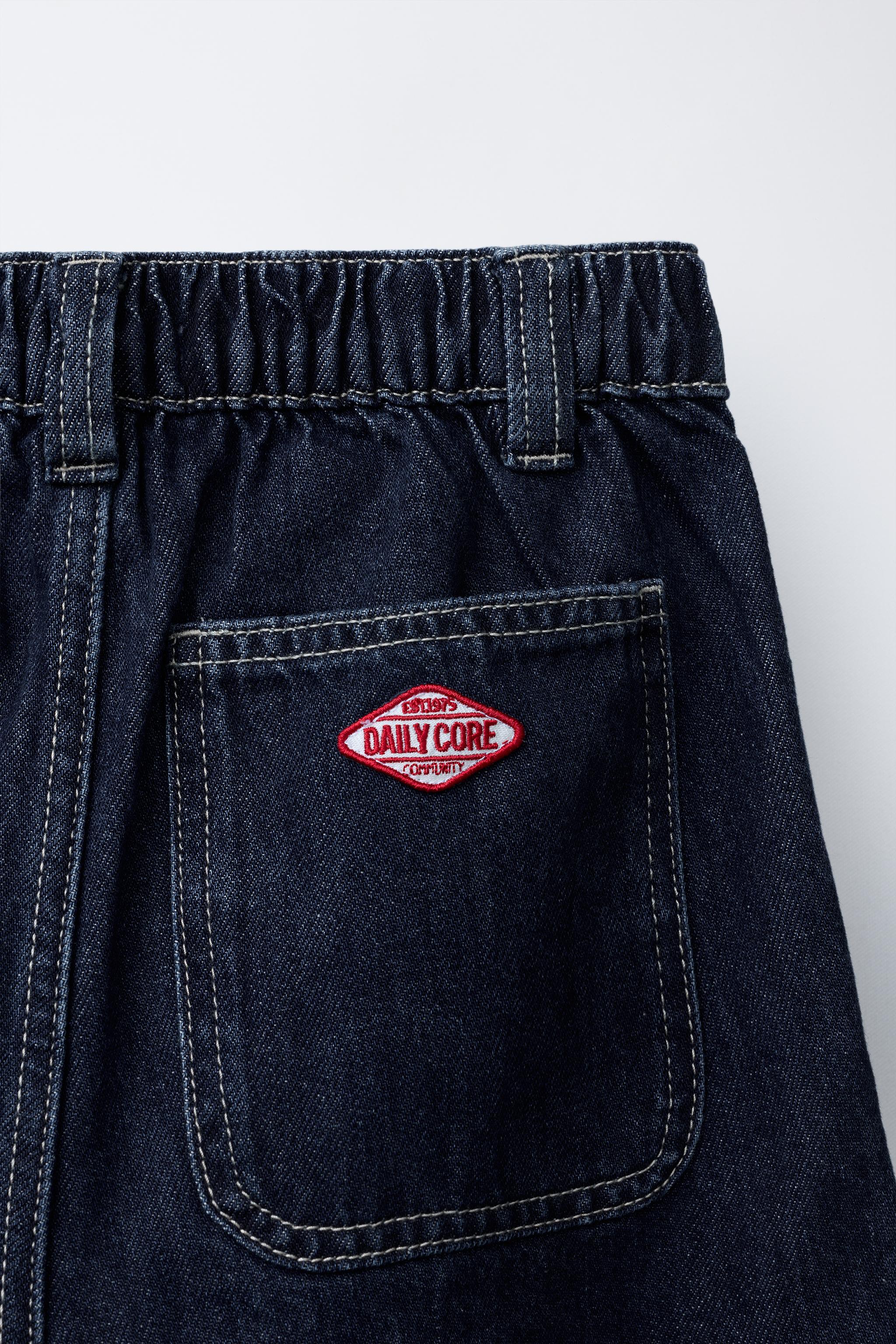 WIDE LEG CUFFED JEANS