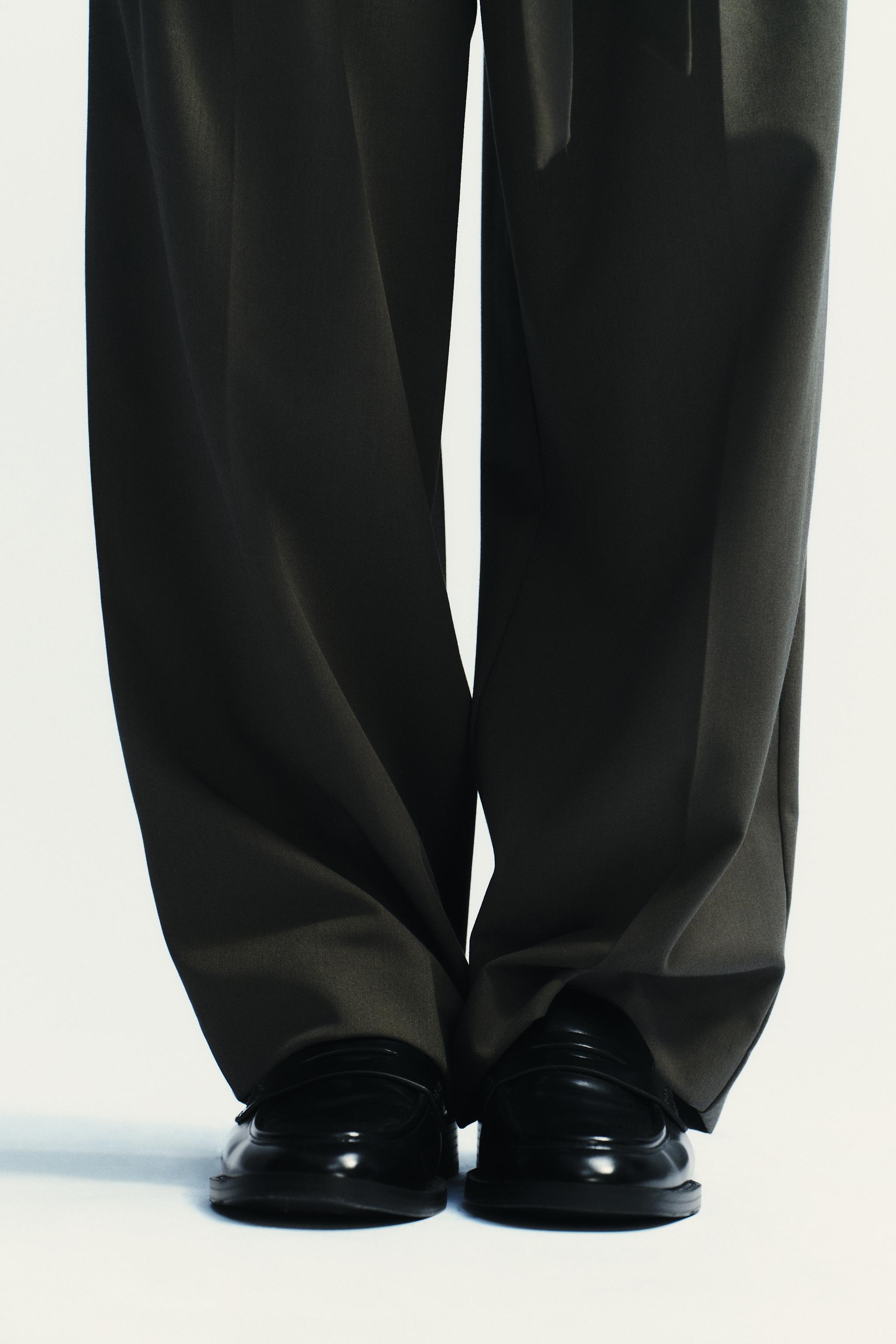 PLEATED BELTED PANTS