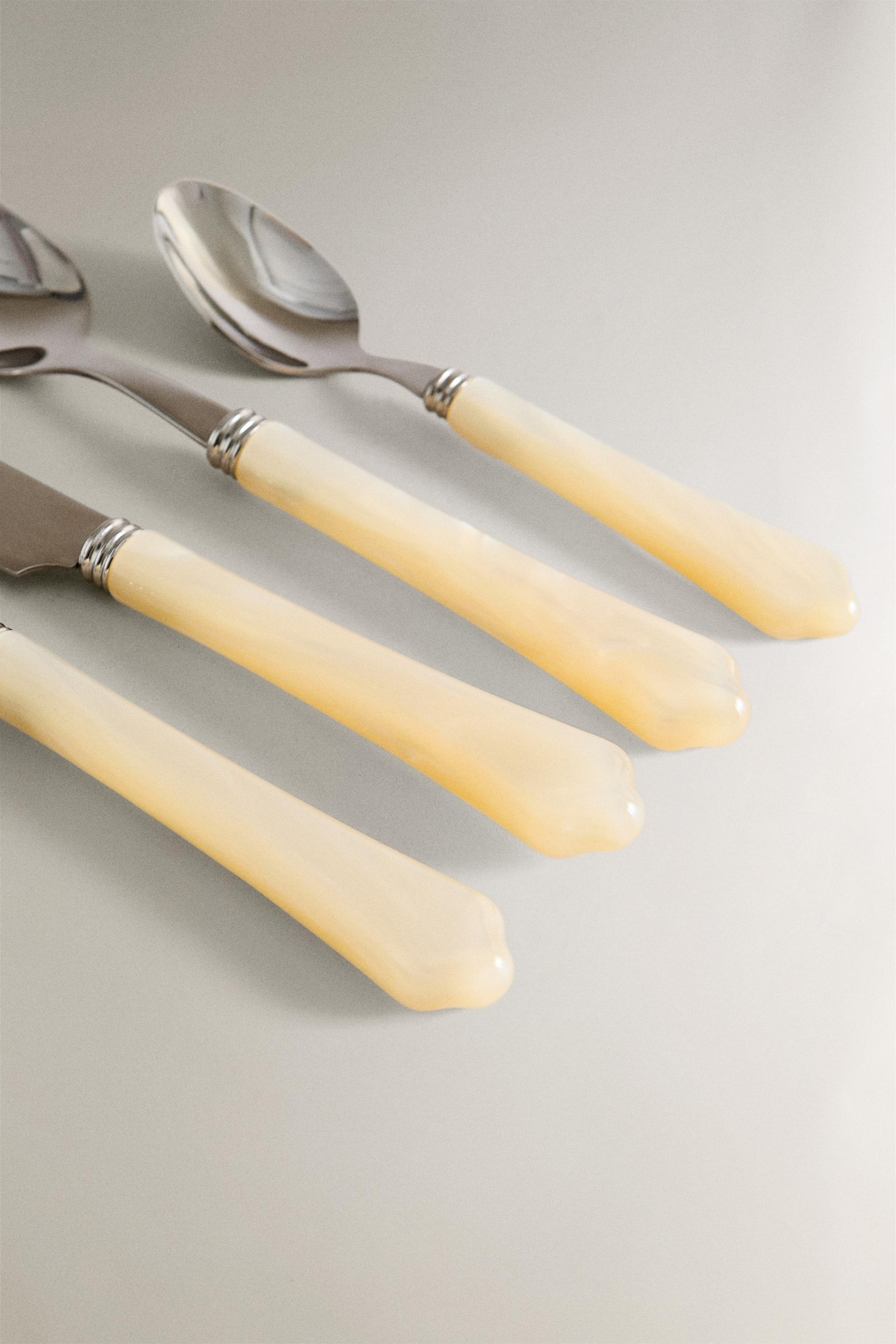 4-PIECE FLATWARE SET WITH PEARL-EFFECT HANDLE