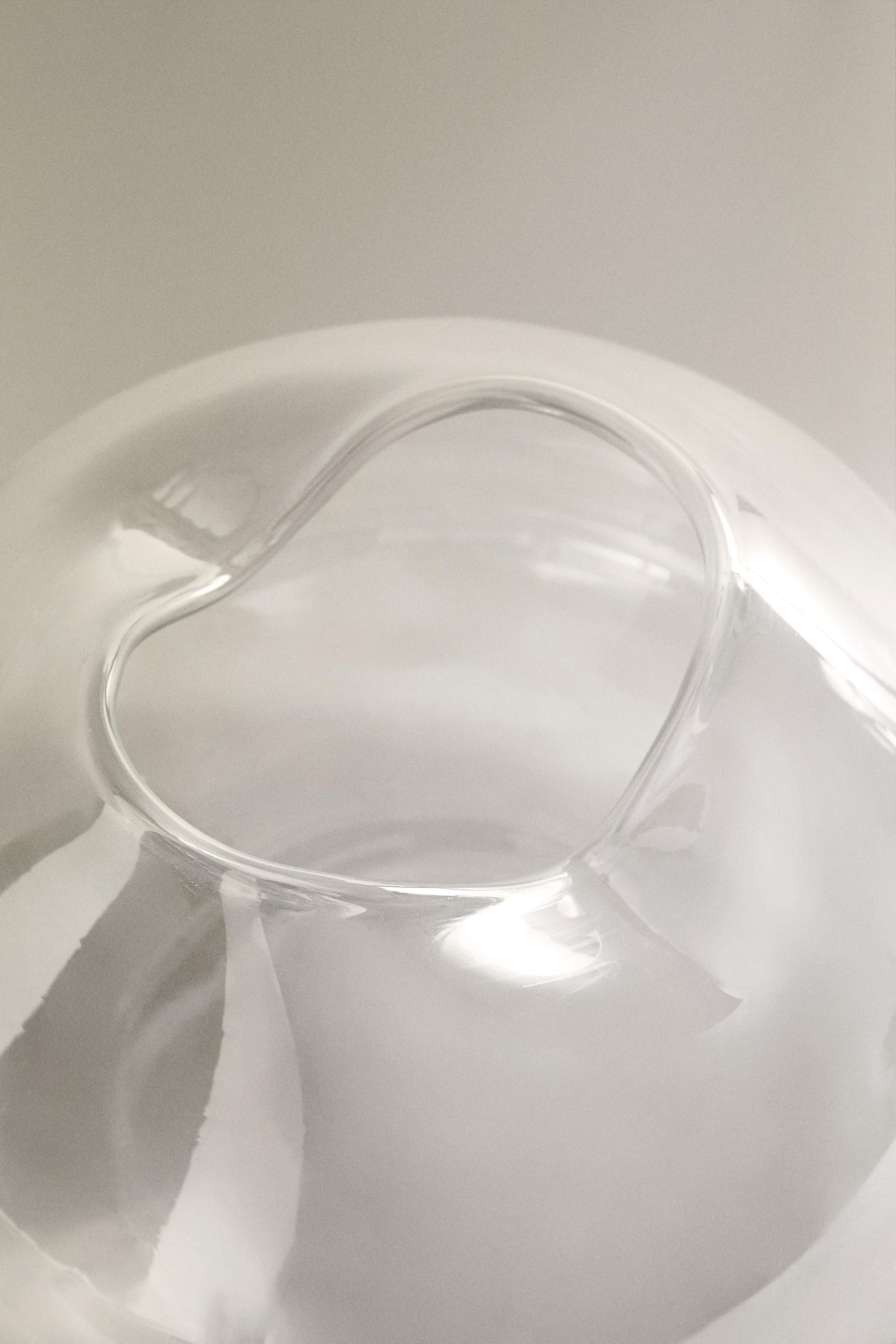 VASE WITH AN IRREGULAR LOW NECK