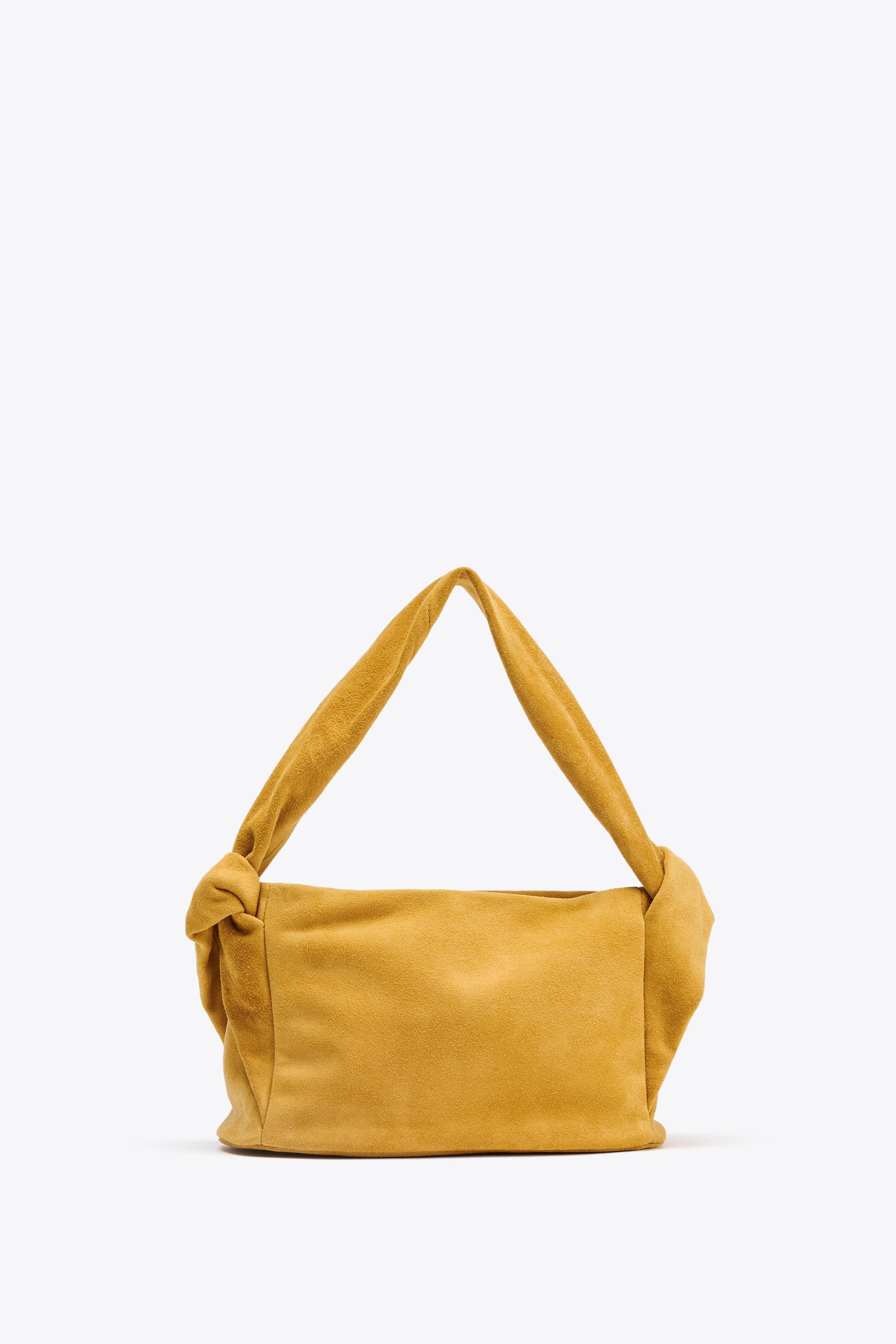 SPLIT LEATHER HANDBAG