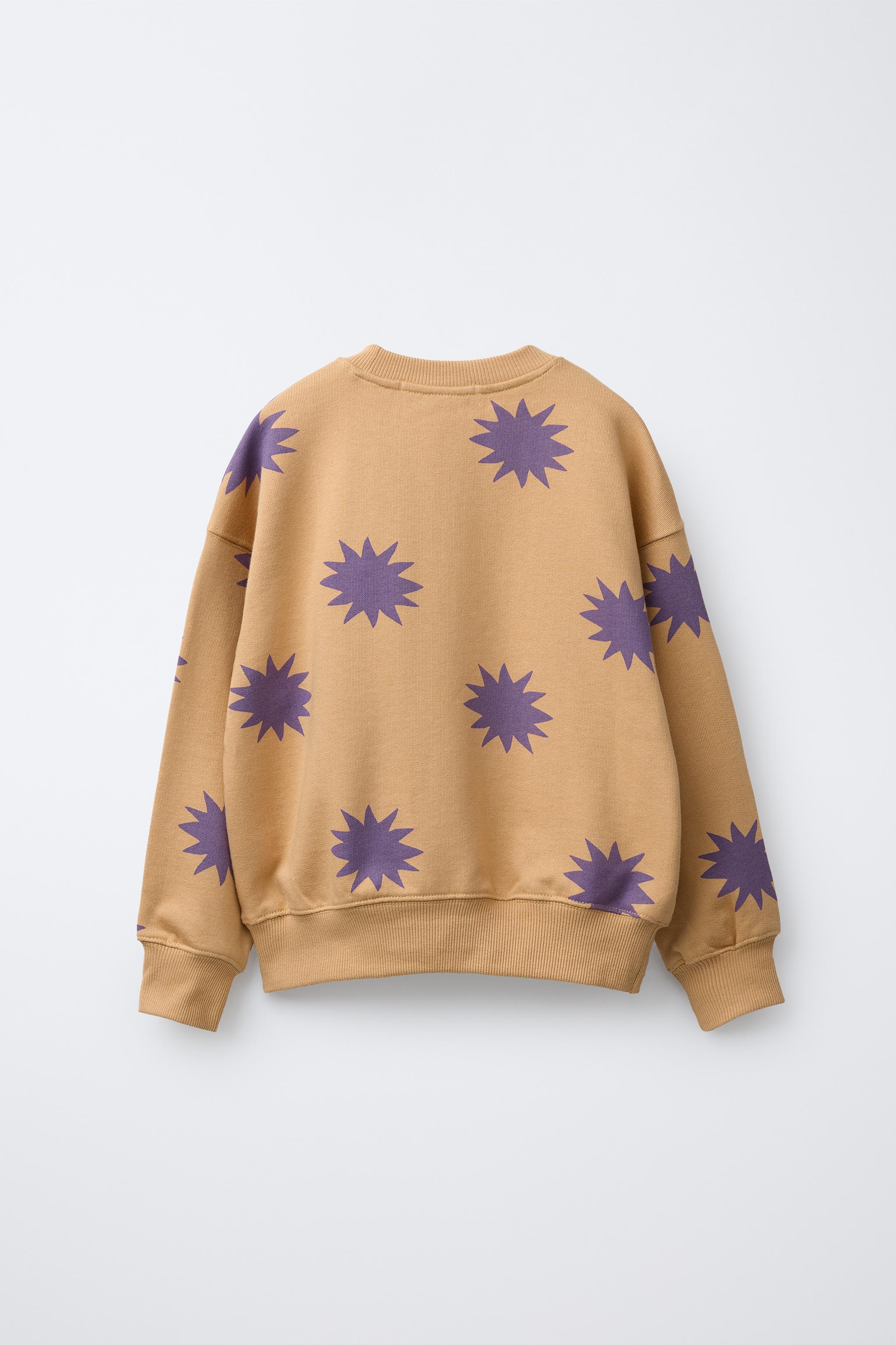 STAR PRINT SWEATSHIRT