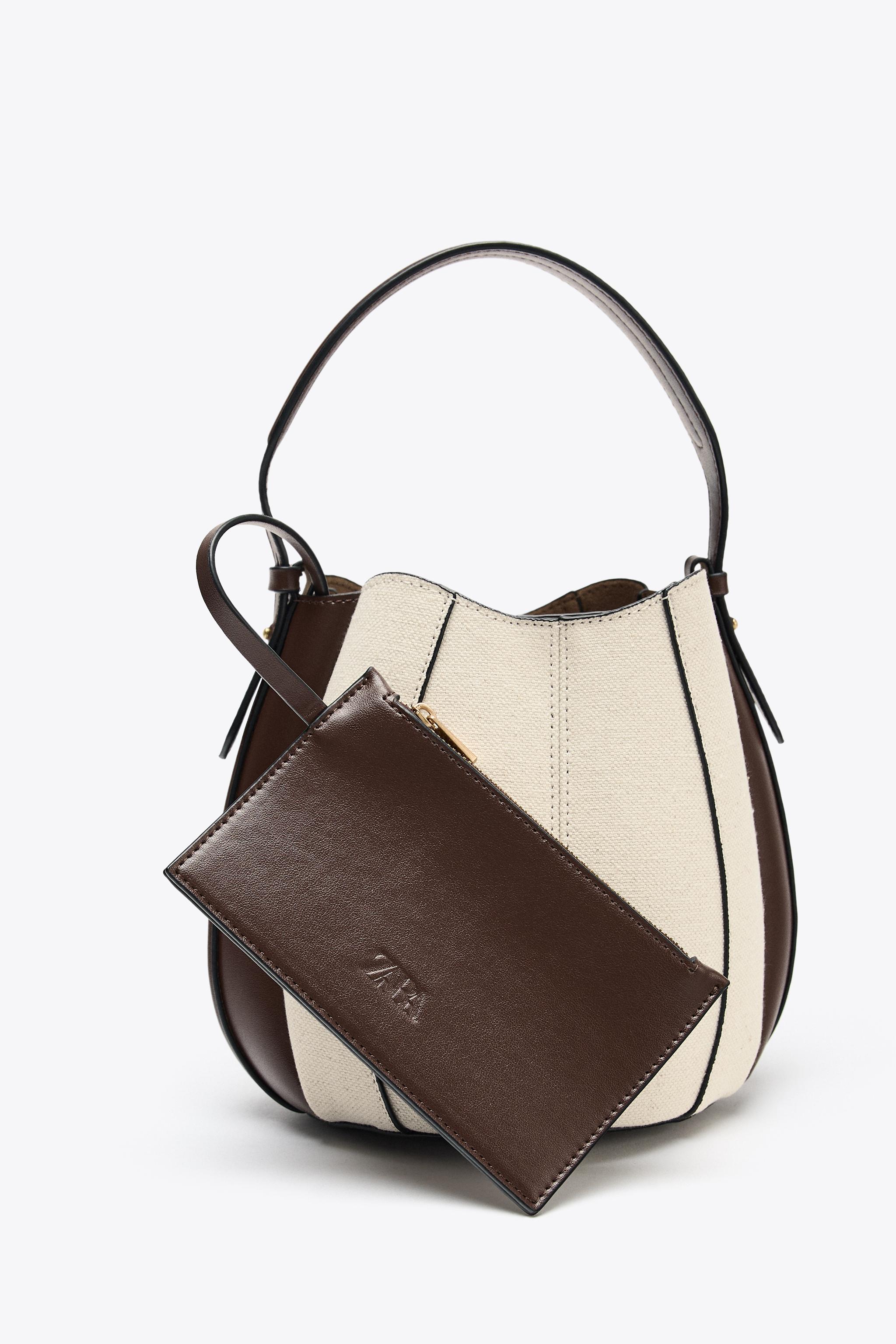 TOPSTITCHED BUCKET BAG