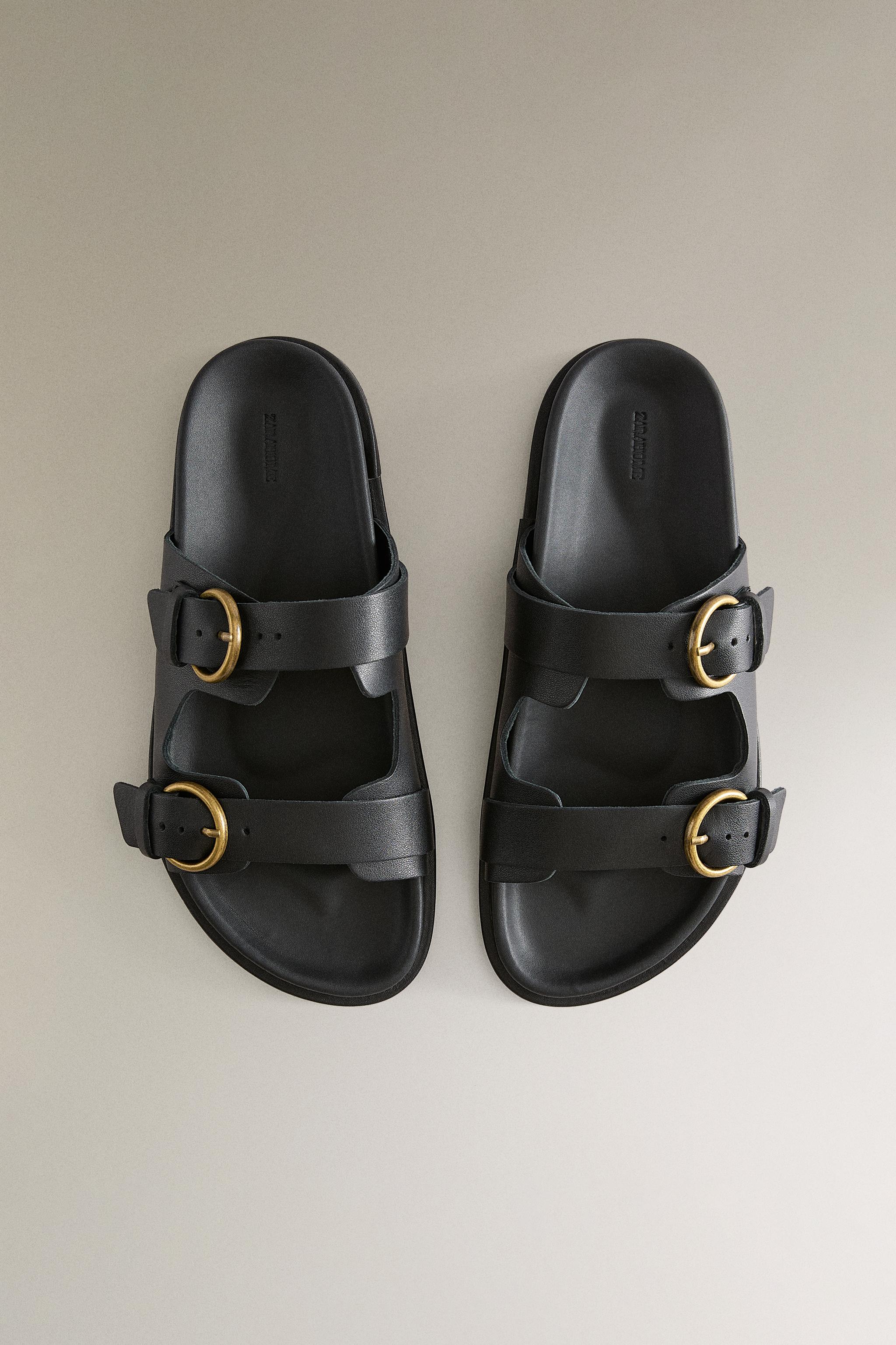 FLAT LEATHER SANDALS WITH BUCKLES