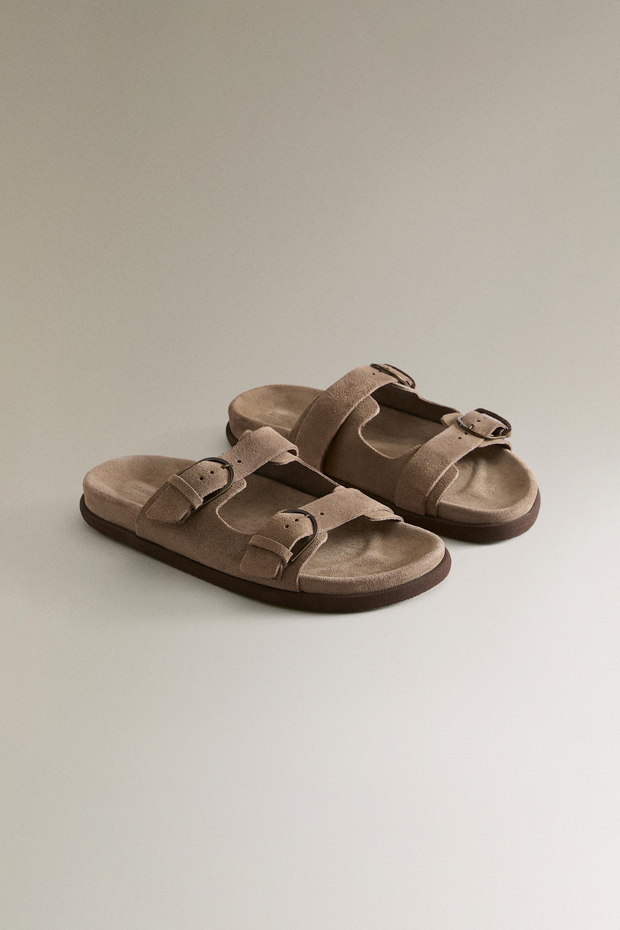 FLAT LEATHER SANDALS WITH BUCKLES
