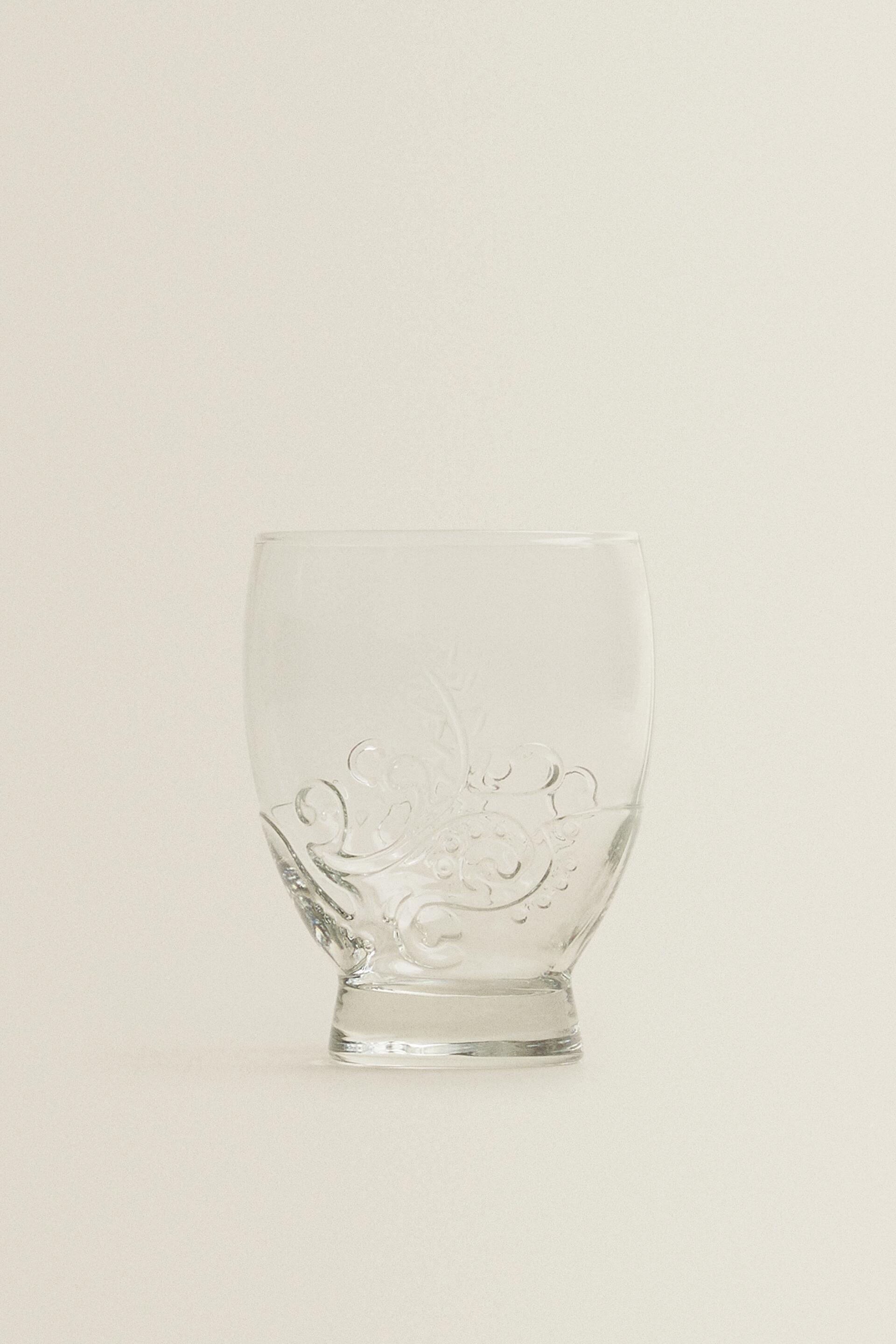 RAISED FLORAL DESIGN GLASS TUMBLER