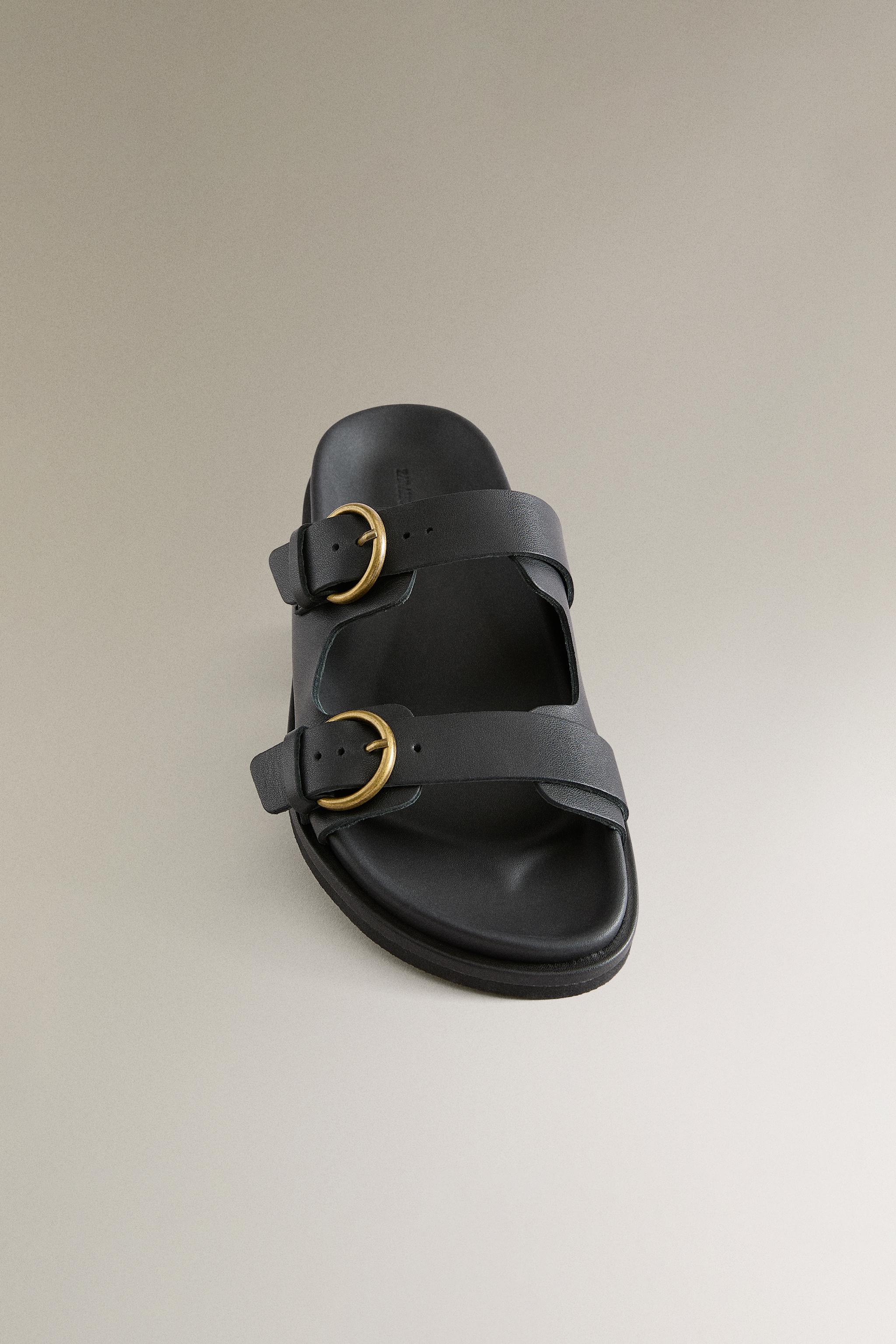FLAT LEATHER SANDALS WITH BUCKLES