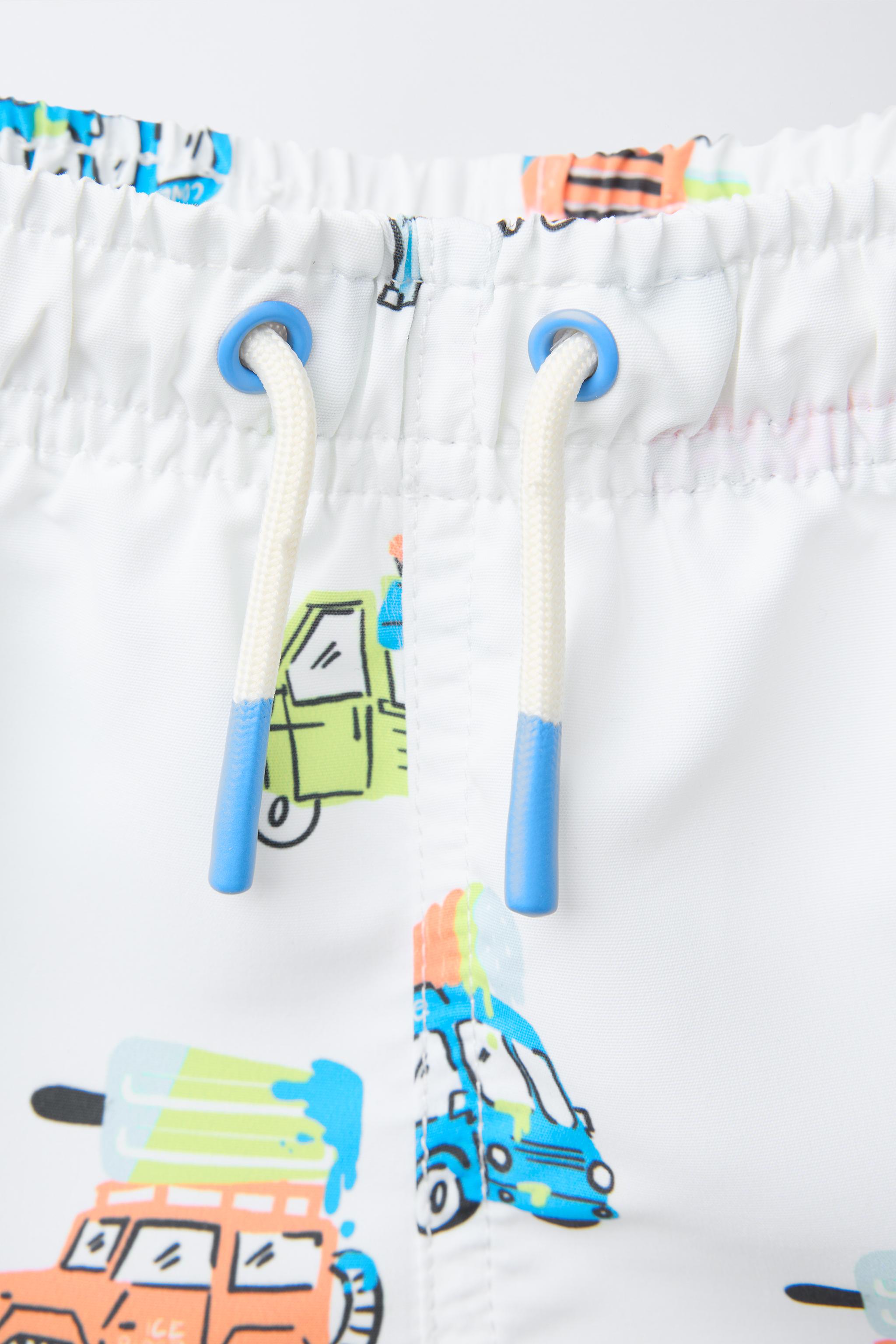 2-6 YEARS/ CARS AND ICE CREAM SWIM SHORTS