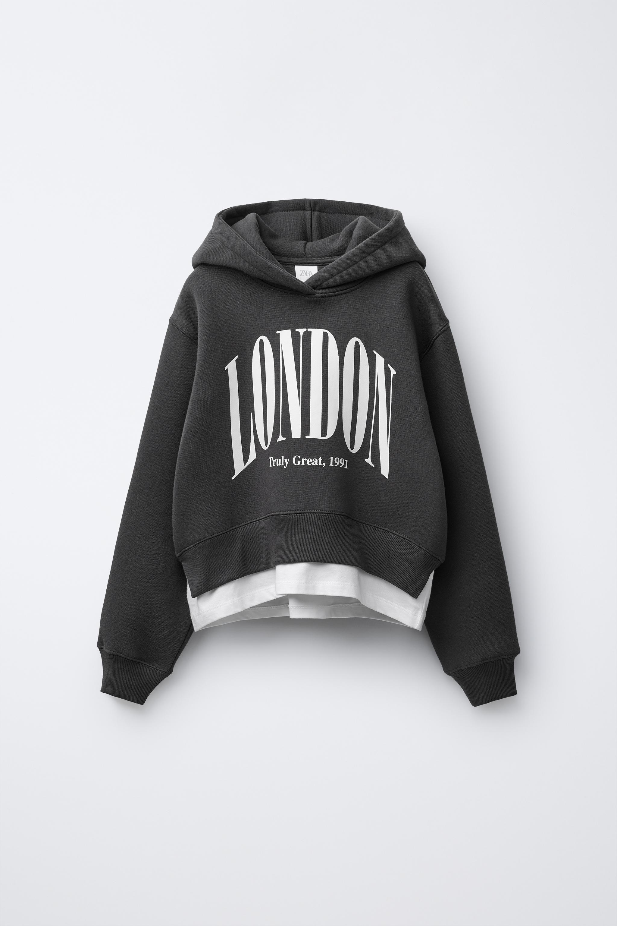 VARSITY DOUBLE HEM HOODED SWEATSHIRT