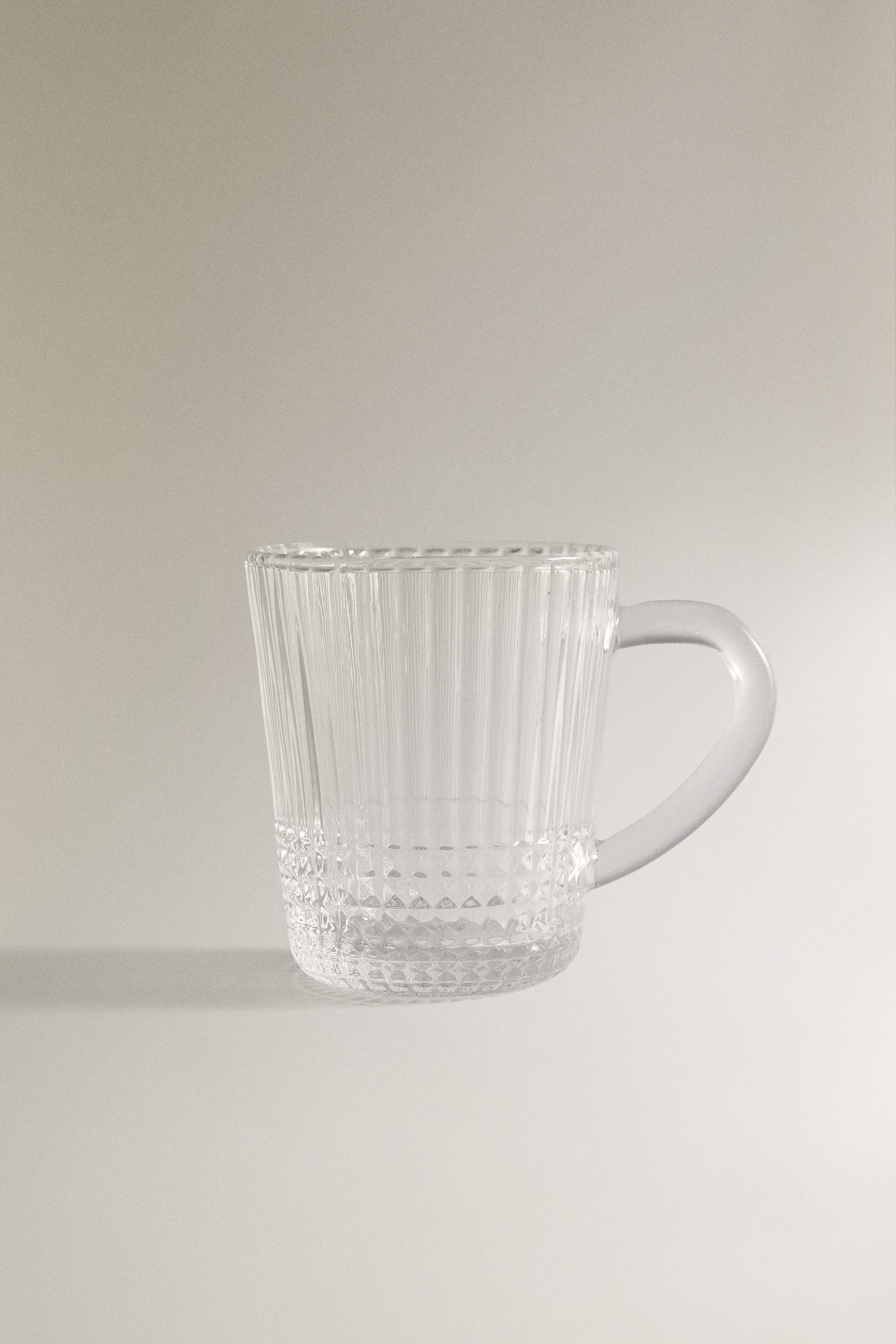 GLASS MUG WITH A RAISED GEOMETRIC DESIGN