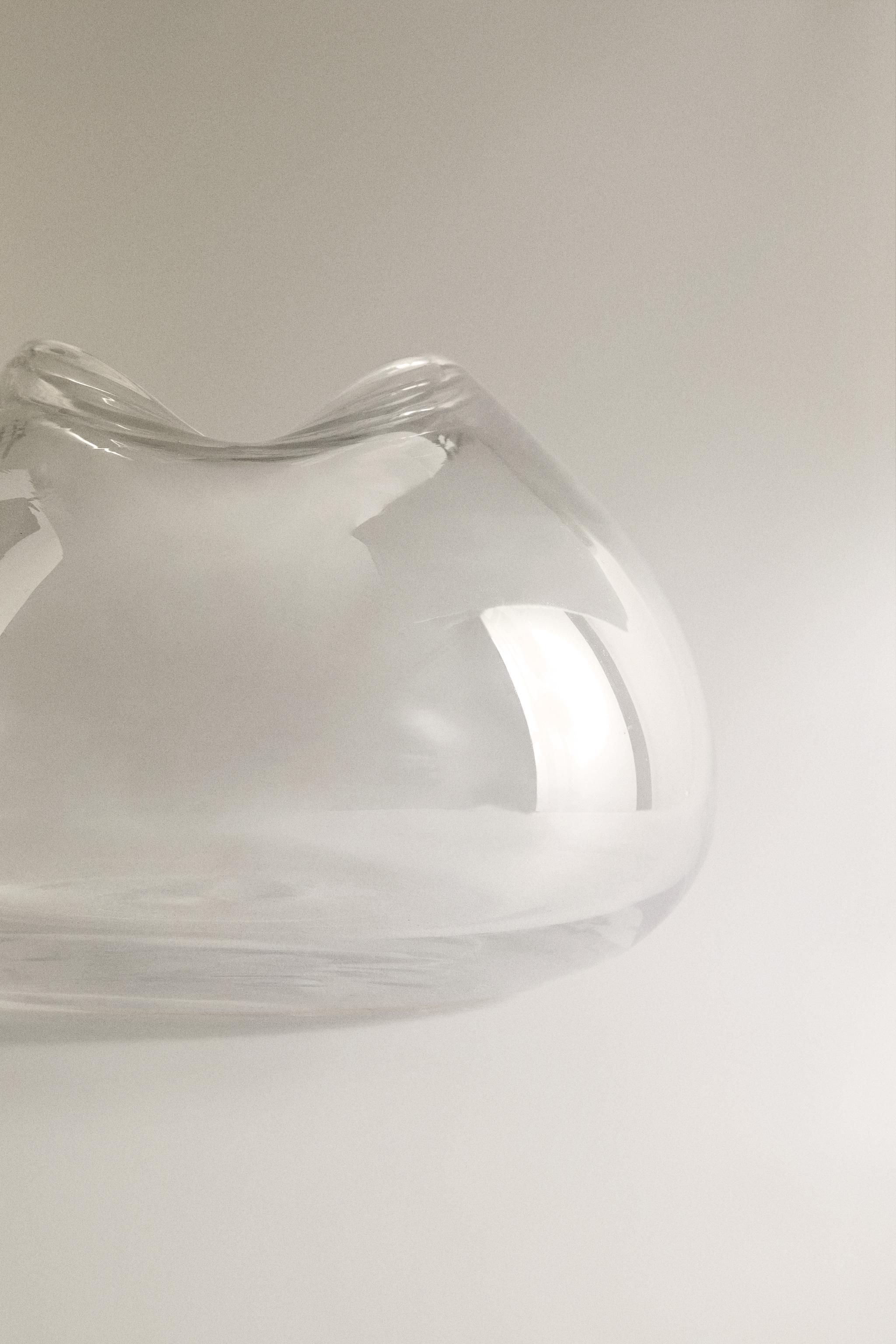 VASE WITH AN IRREGULAR LOW NECK