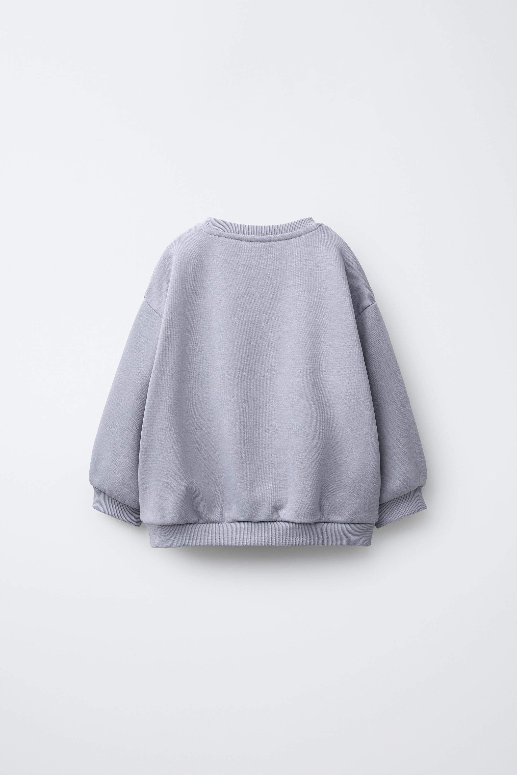 HEART POCKET SWEATSHIRT