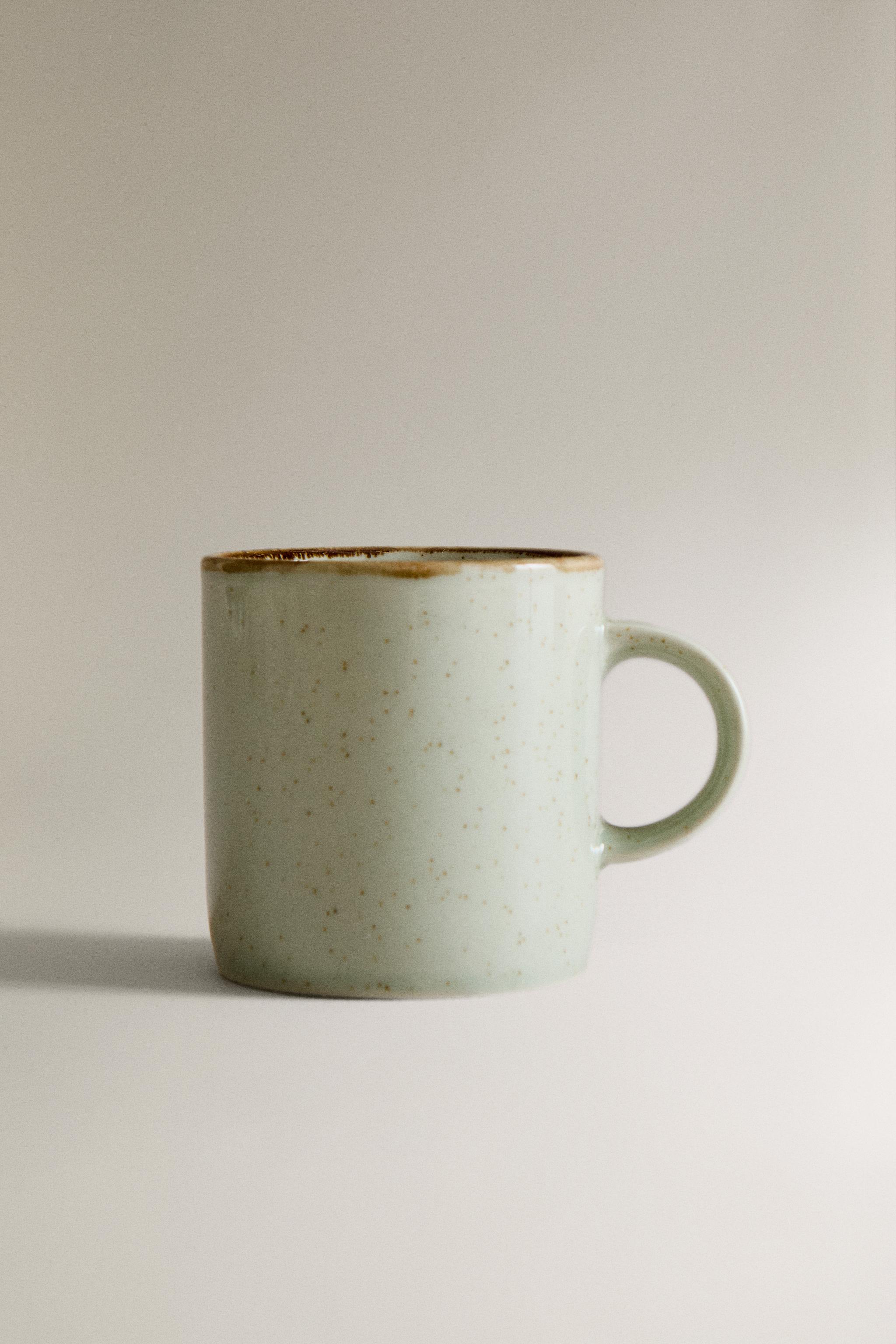 PORCELAIN MUG WITH ANTIQUE FINISH RIM
