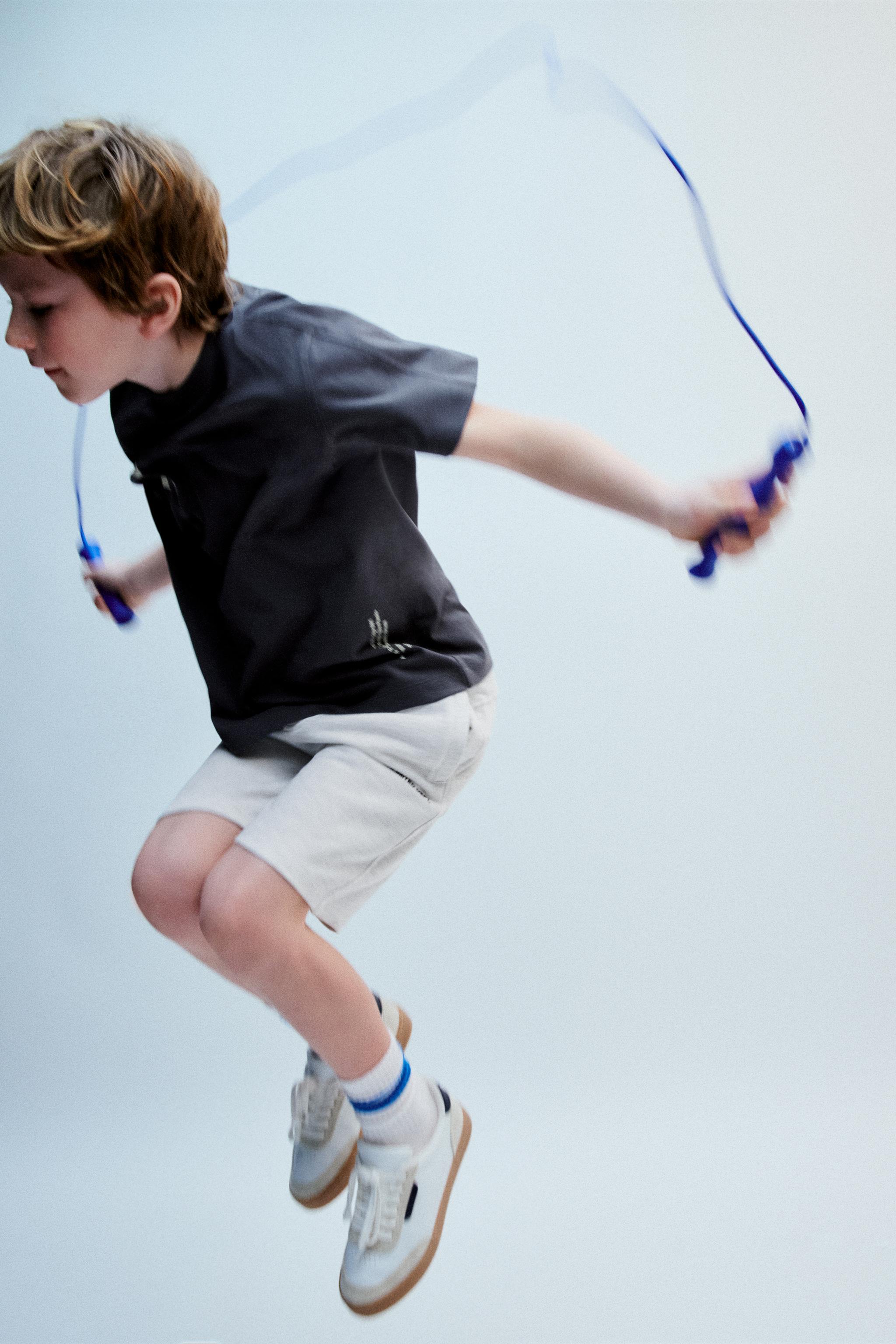 STRAIGHT FIT EMBOSSED TEXT TERRY SHORTS