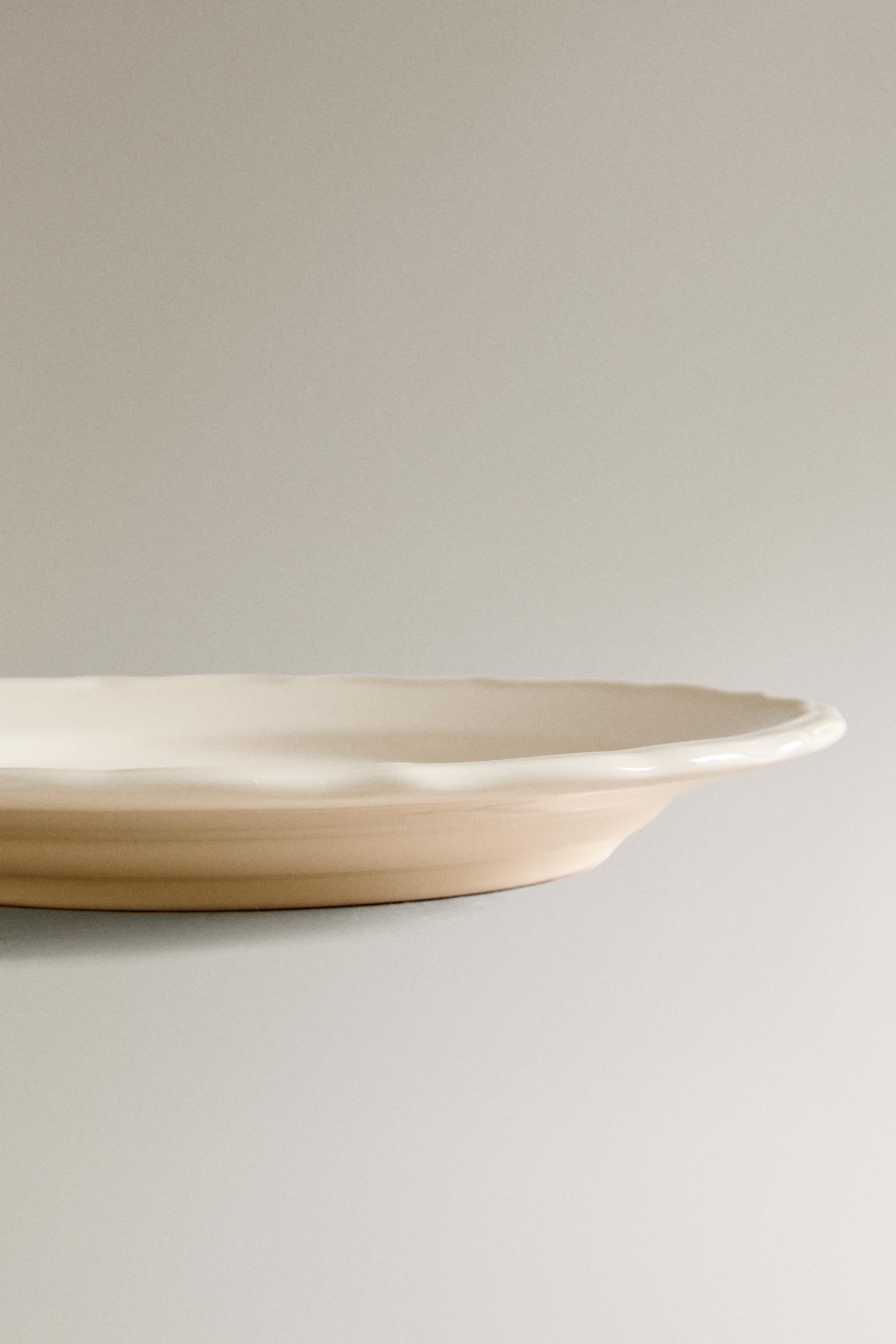 EARTHENWARE DESSERT PLATE WITH RAISED-DESIGN EDGE