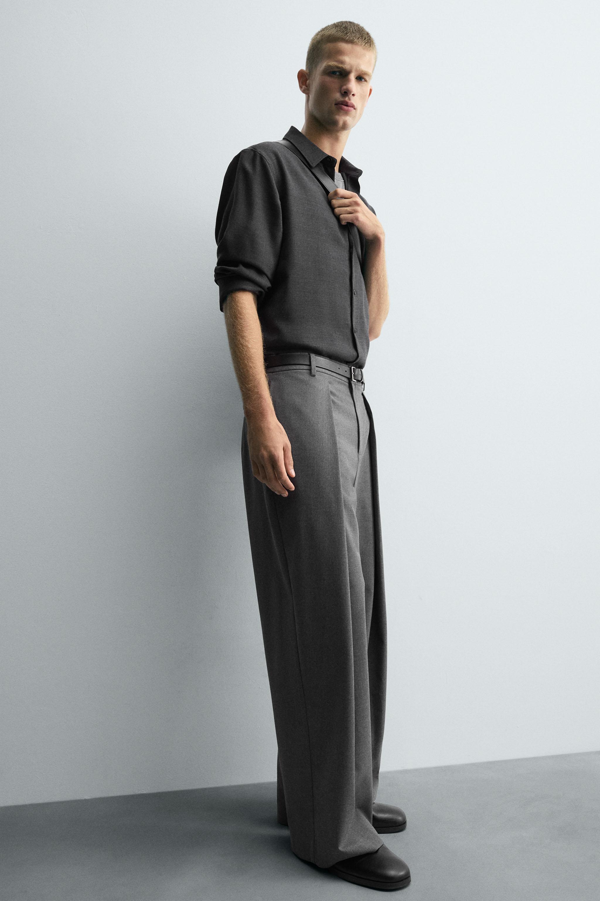 PLEATED WIDE FIT PANTS