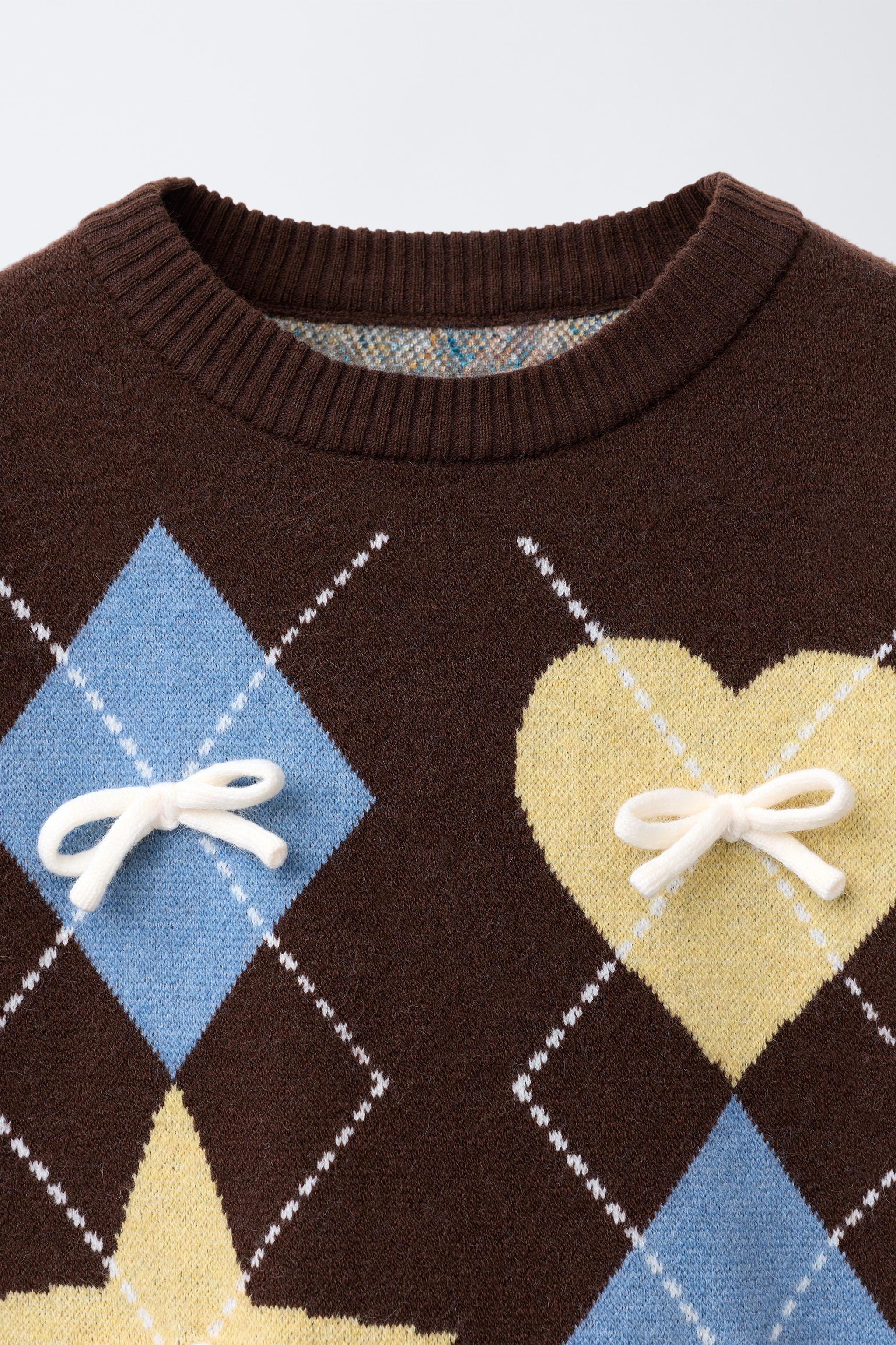 DIAMOND AND BOW KNIT SWEATER