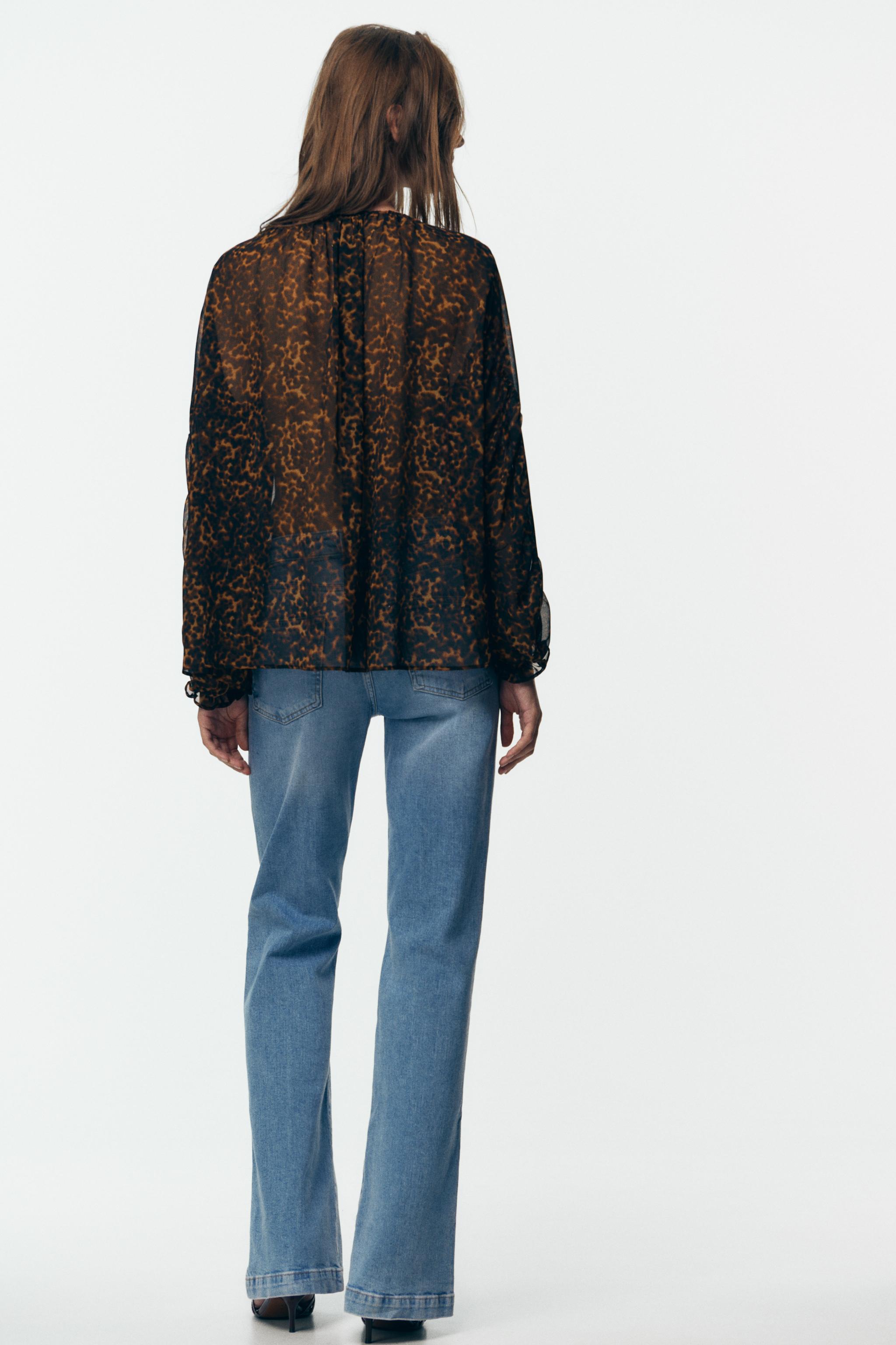 ANIMAL PRINT SEMI-SHEER BLOUSE