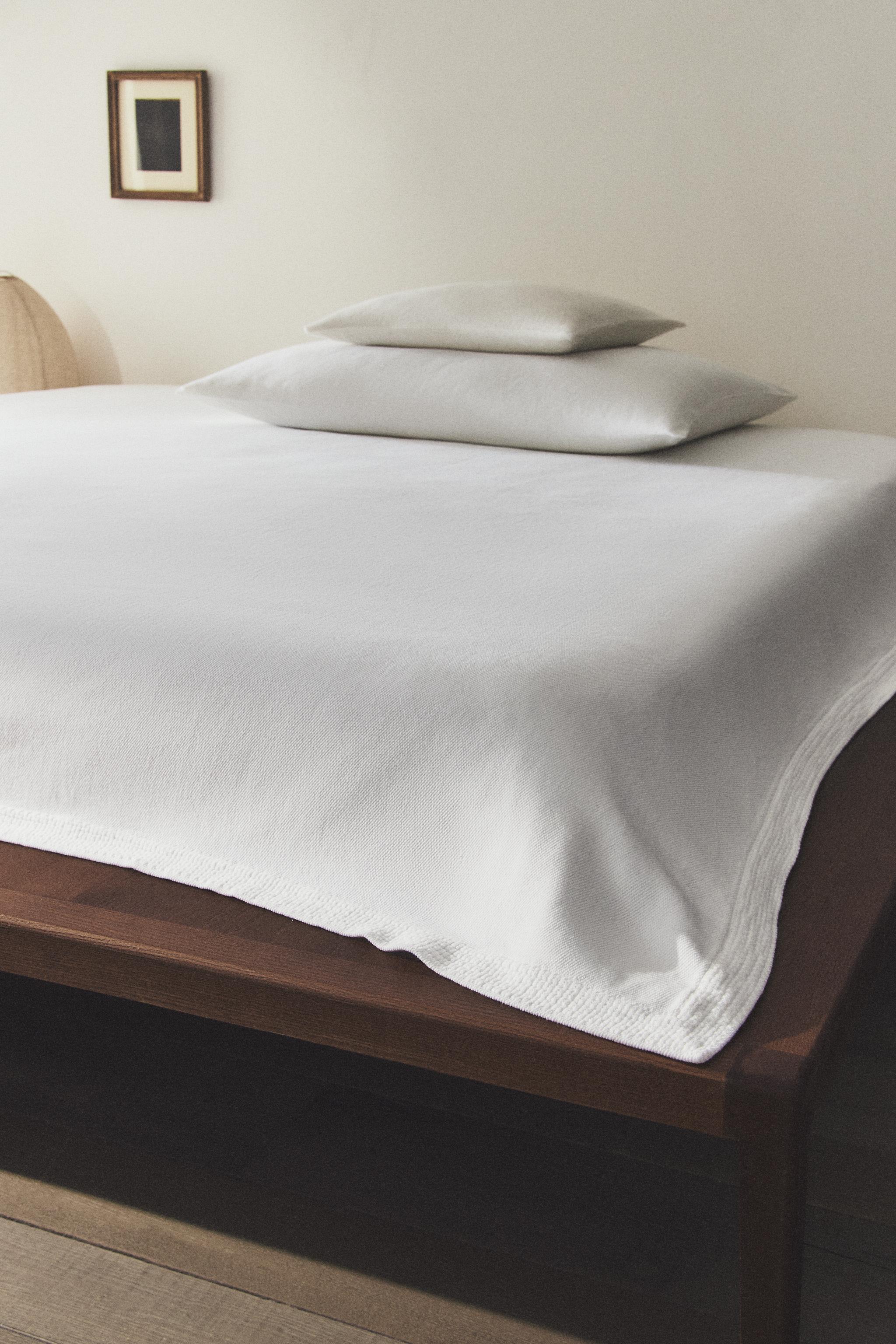 EMBROIDERED BEDSPREAD