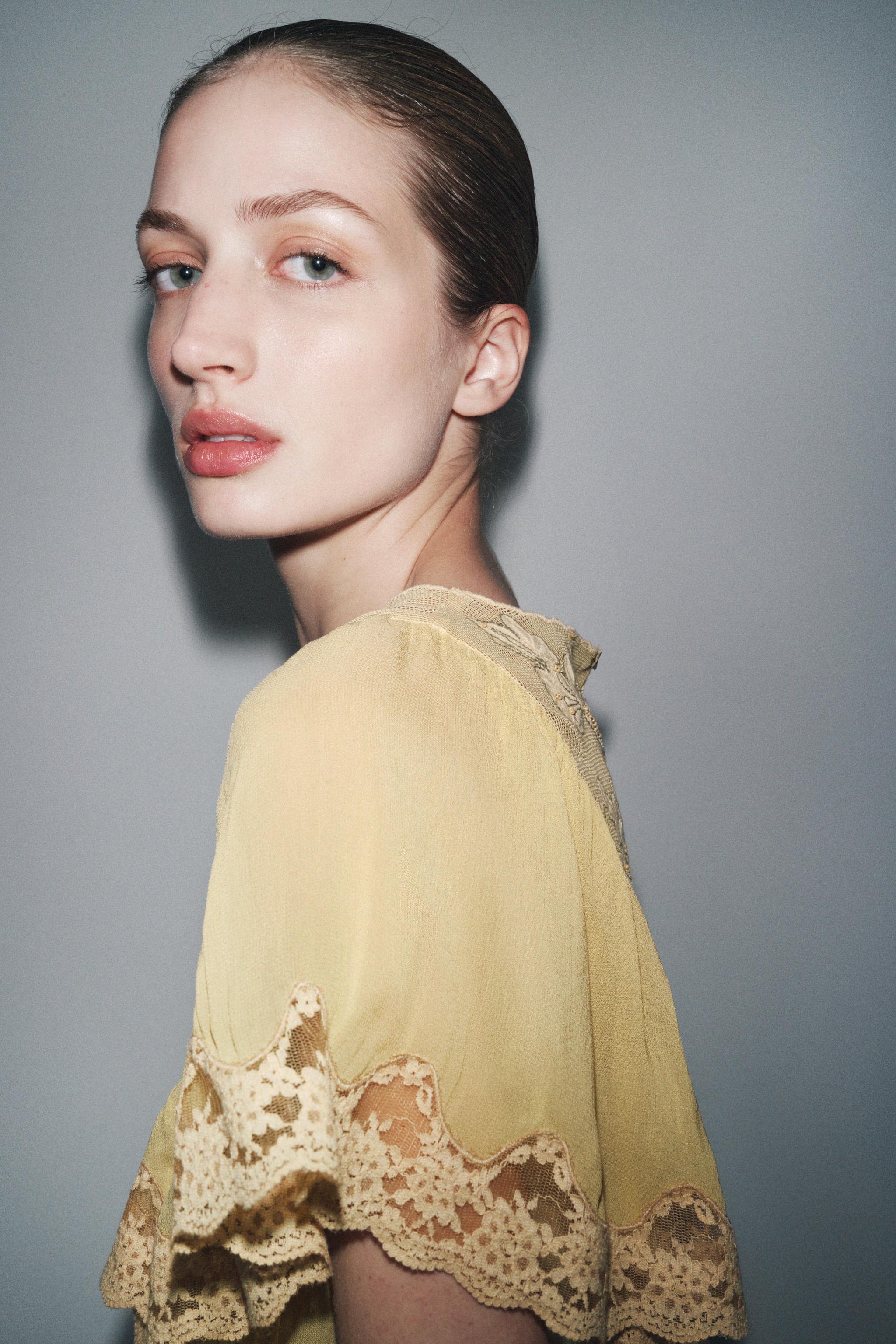 TULLE JUMPSUIT WITH EMBROIDERY AND BEADS