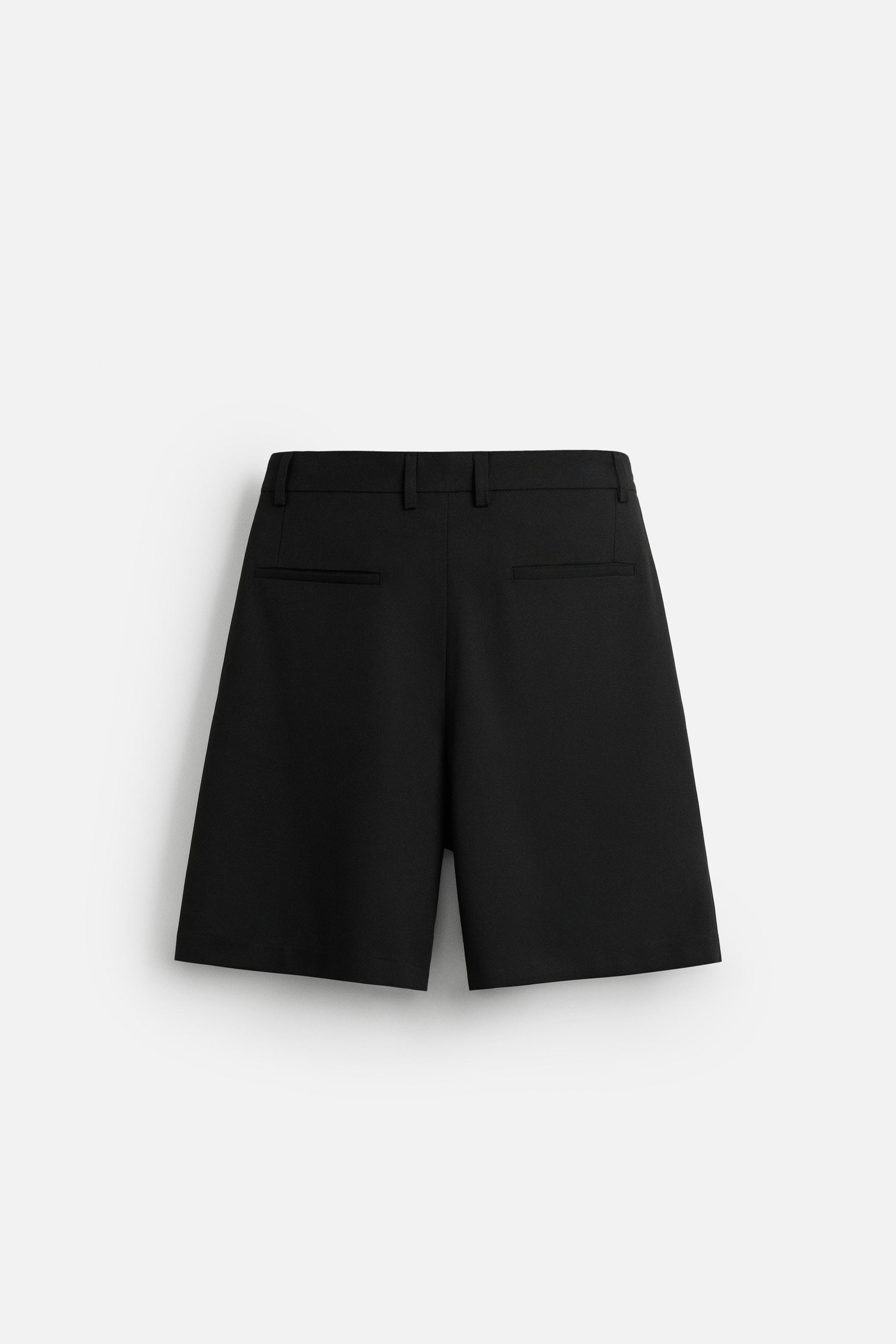 PLEATED RELAXED FIT SHORTS