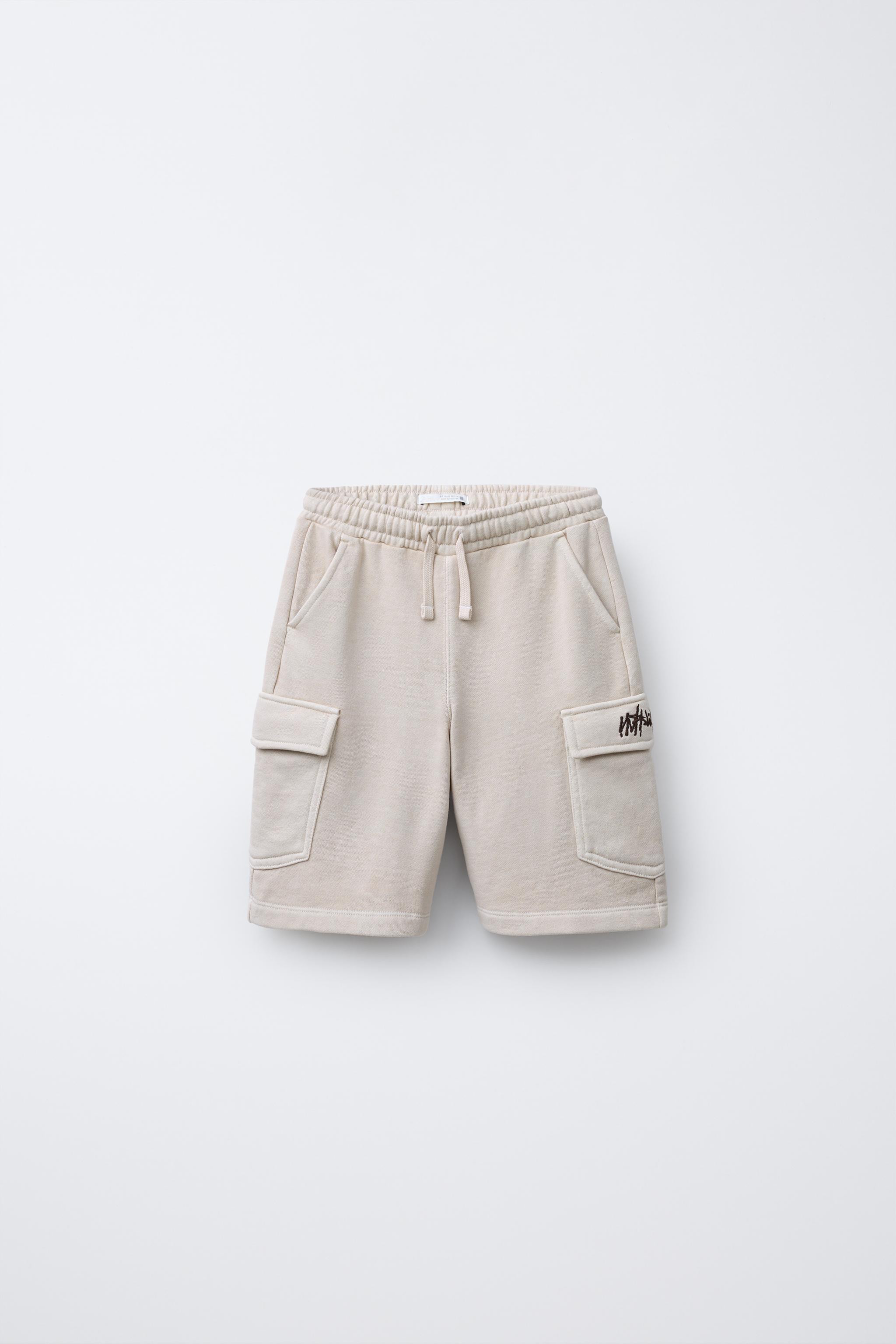 STRAIGHT FIT GRAFFITI CARGO PLUSH SHORTS