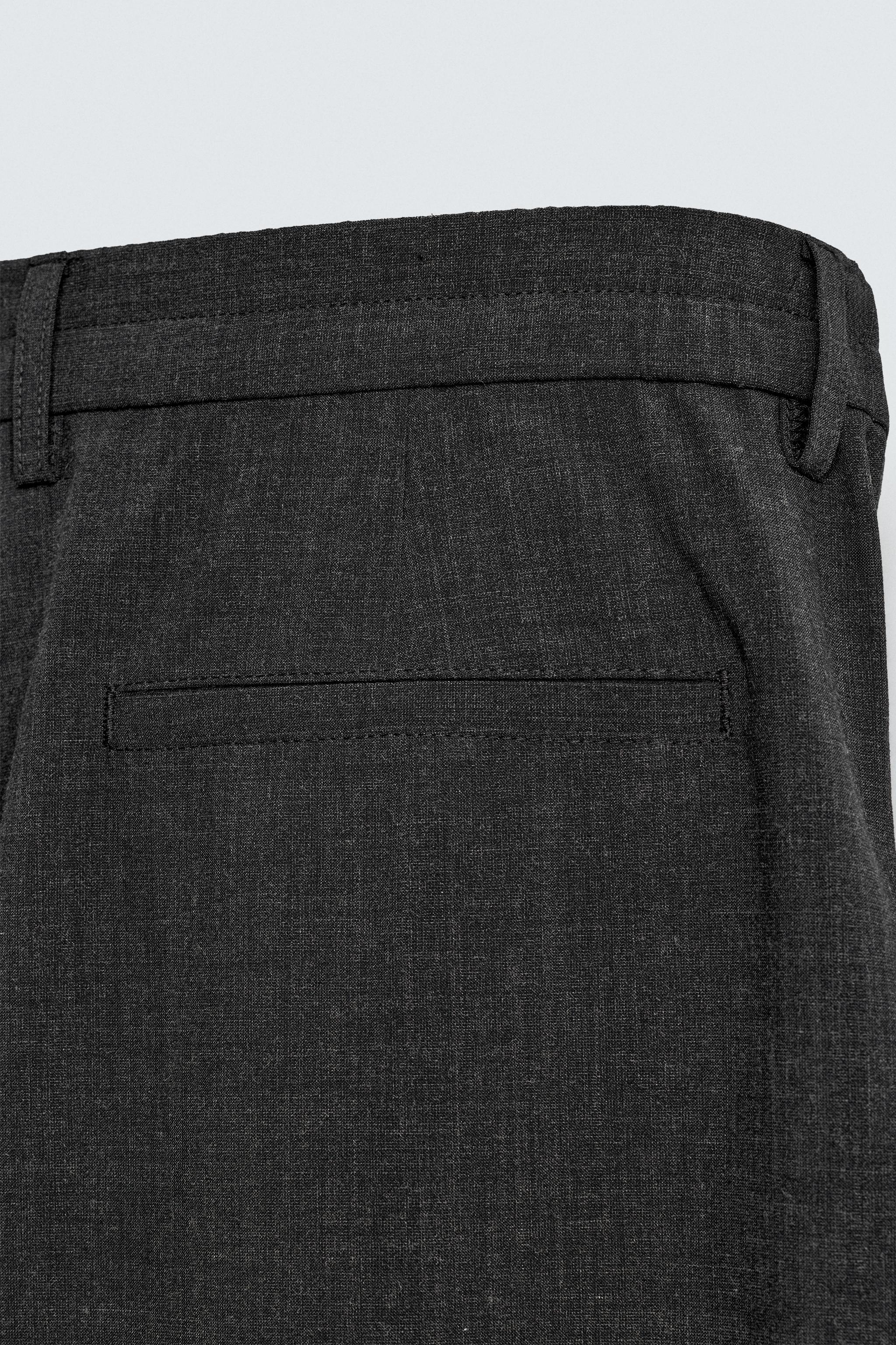 PLEATED WIDE FIT PANTS