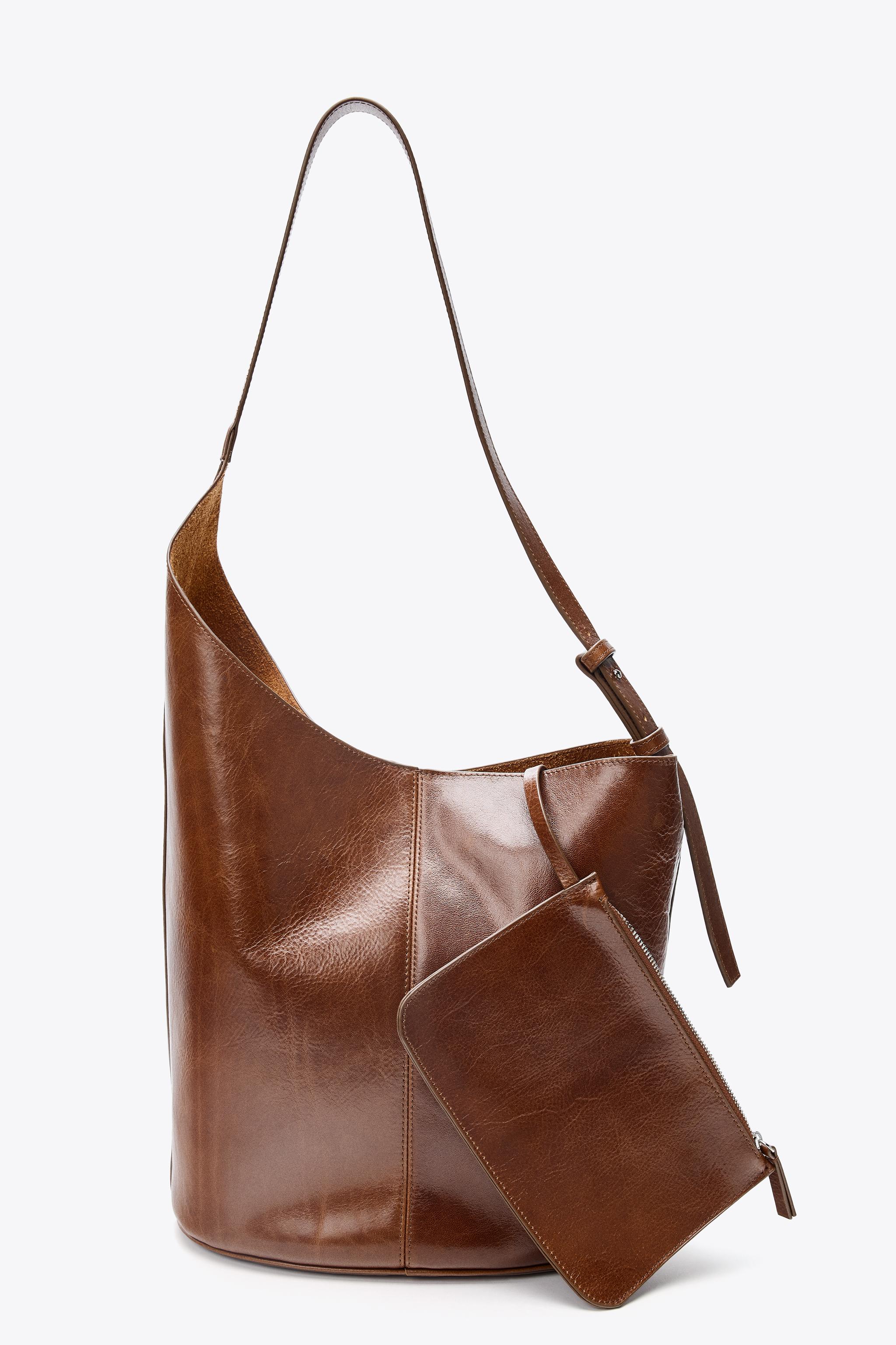 ASYMMETRIC LEATHER BUCKET BAG