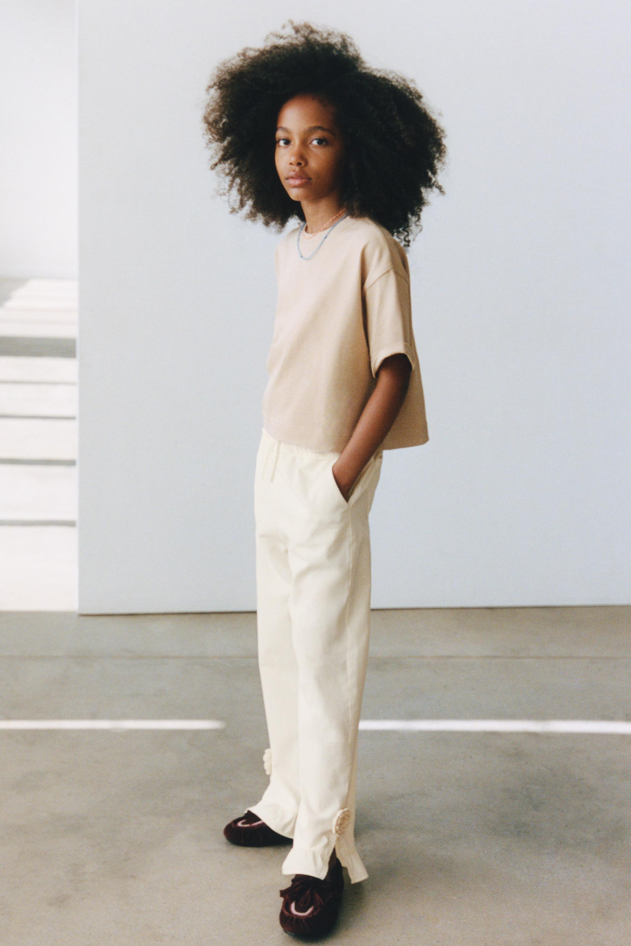 WIDE LEG PANTS WITH CROCHET FLOWER RUFFLES