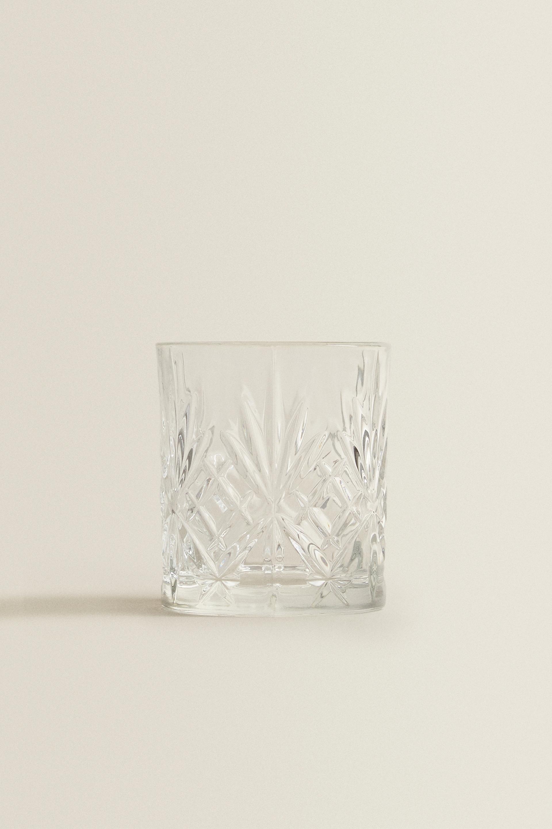 CRYSTALLINE TUMBLER WITH RAISED DESIGN