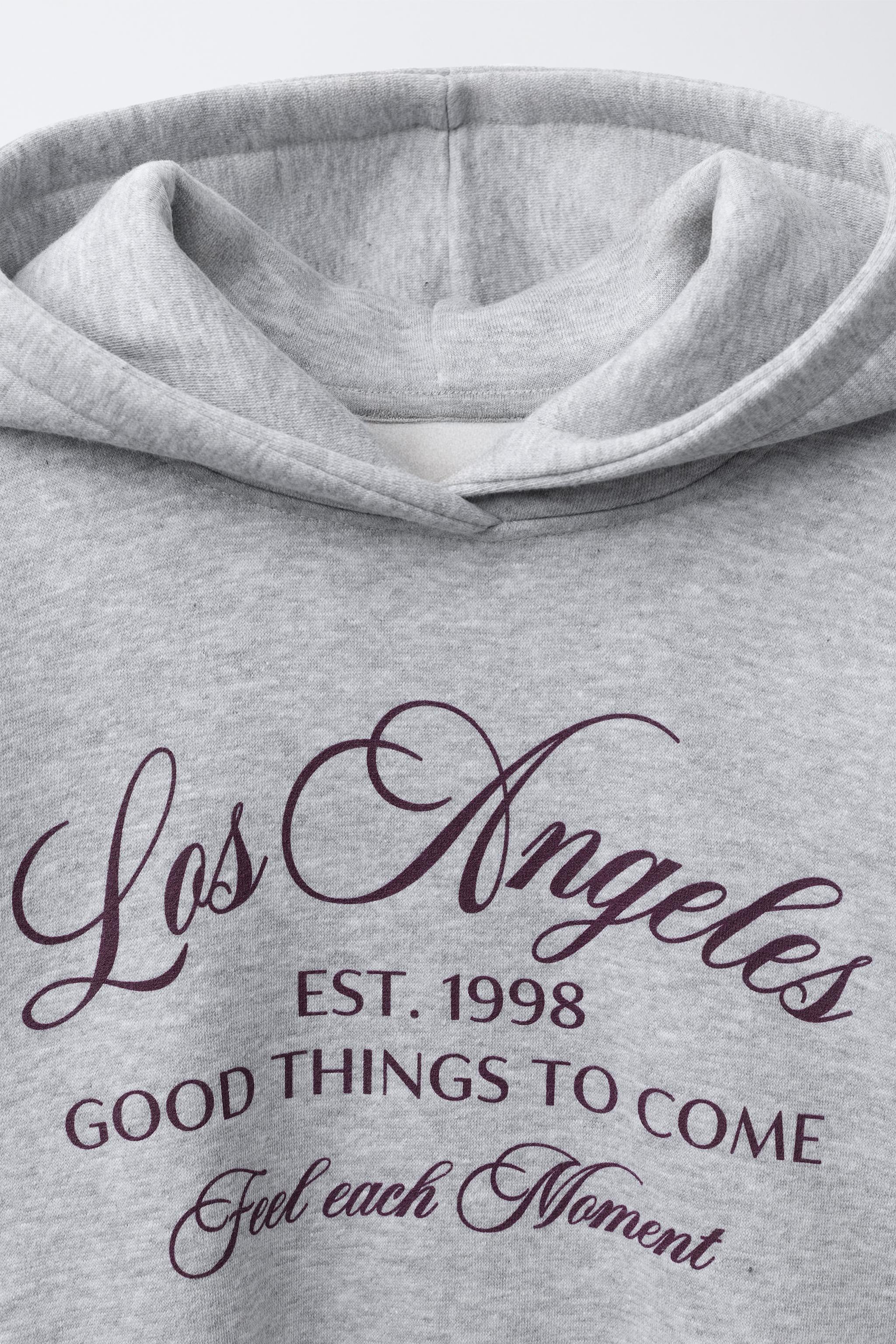 VARSITY DOUBLE HEM HOODED SWEATSHIRT