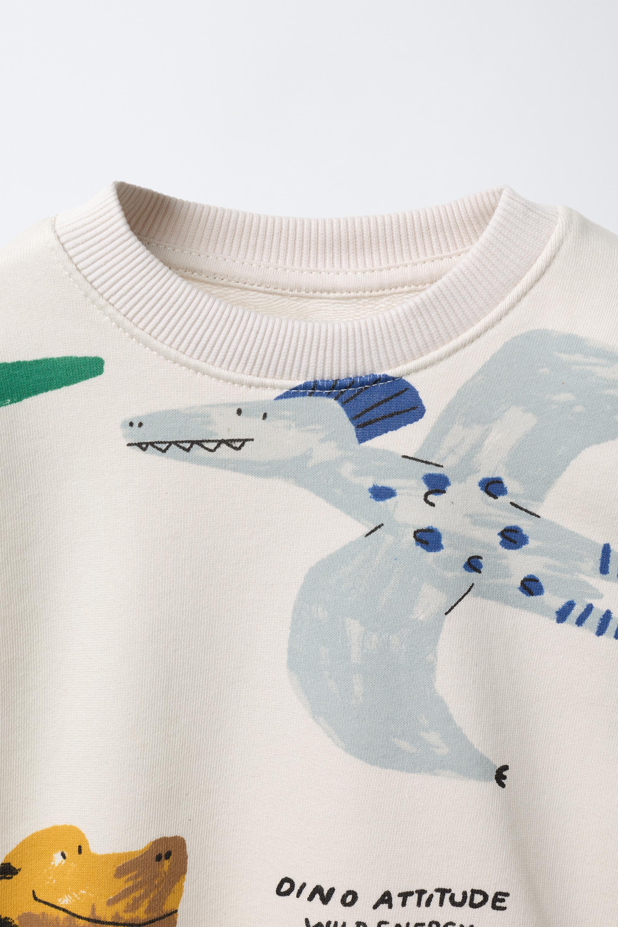 DINOSAUR PRINT SWEATSHIRT