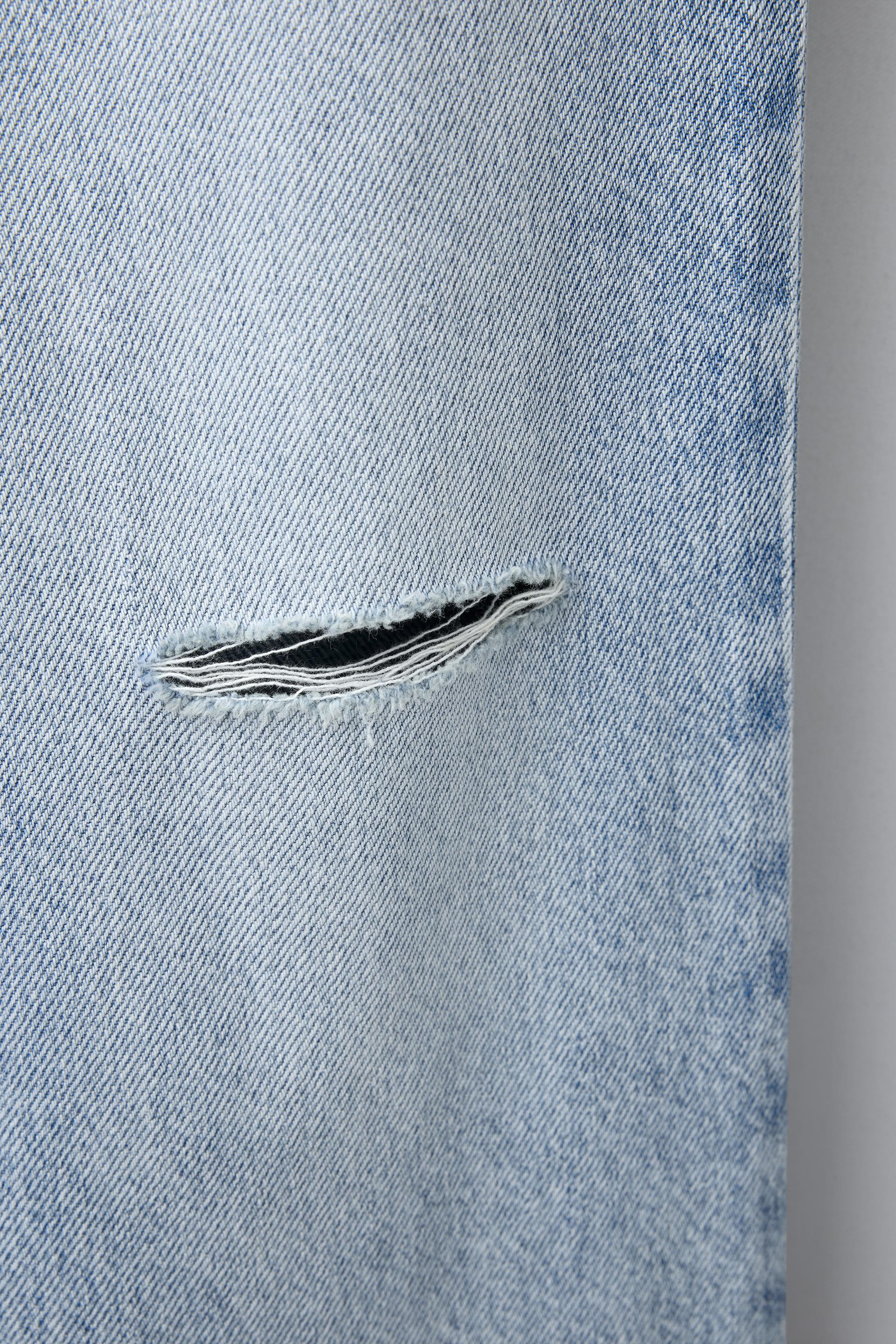 RIPPED RELAXED BAGGY JEANS