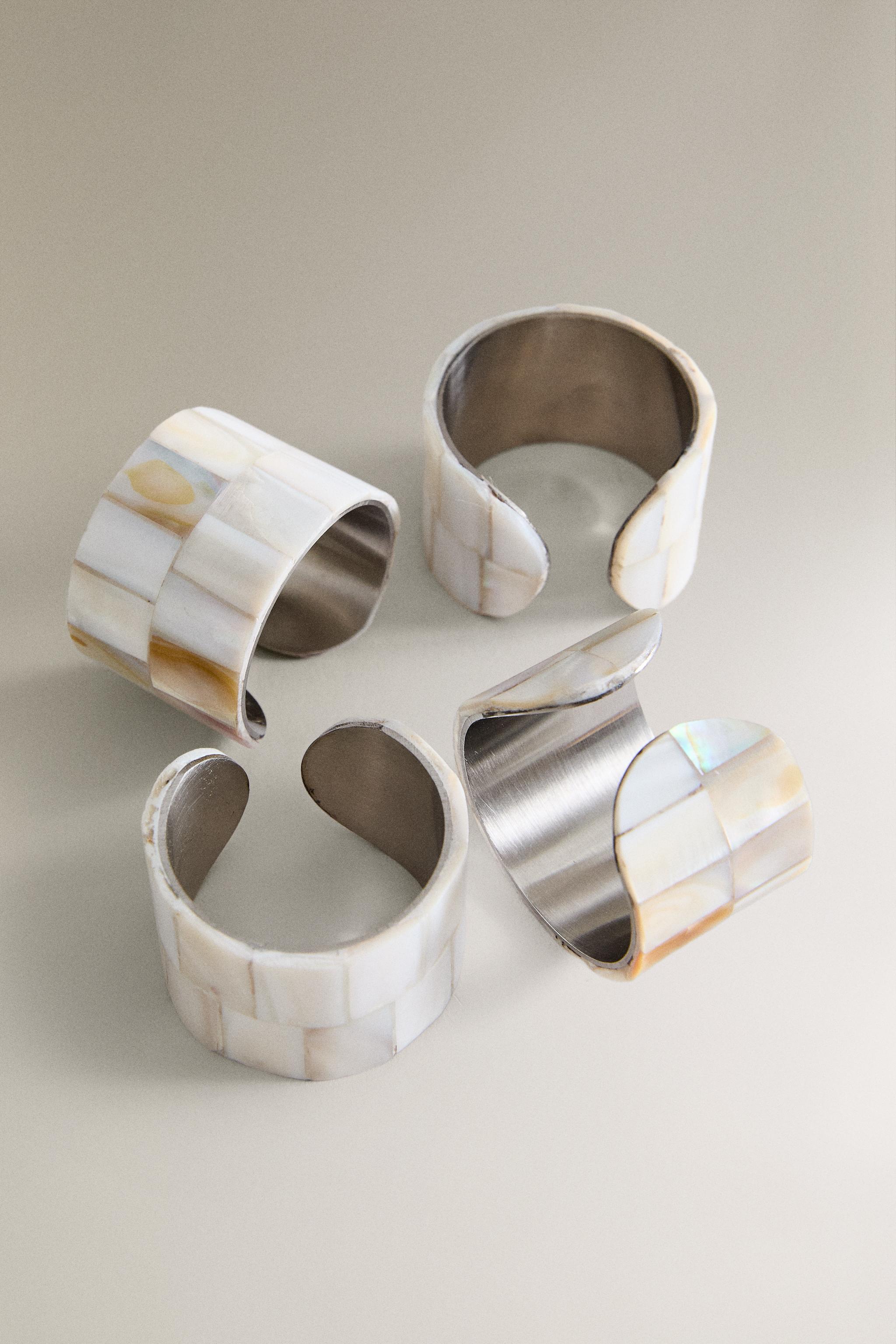 SET OF MOTHER-OF-PEARL NAPKIN RINGS (SET OF 4)