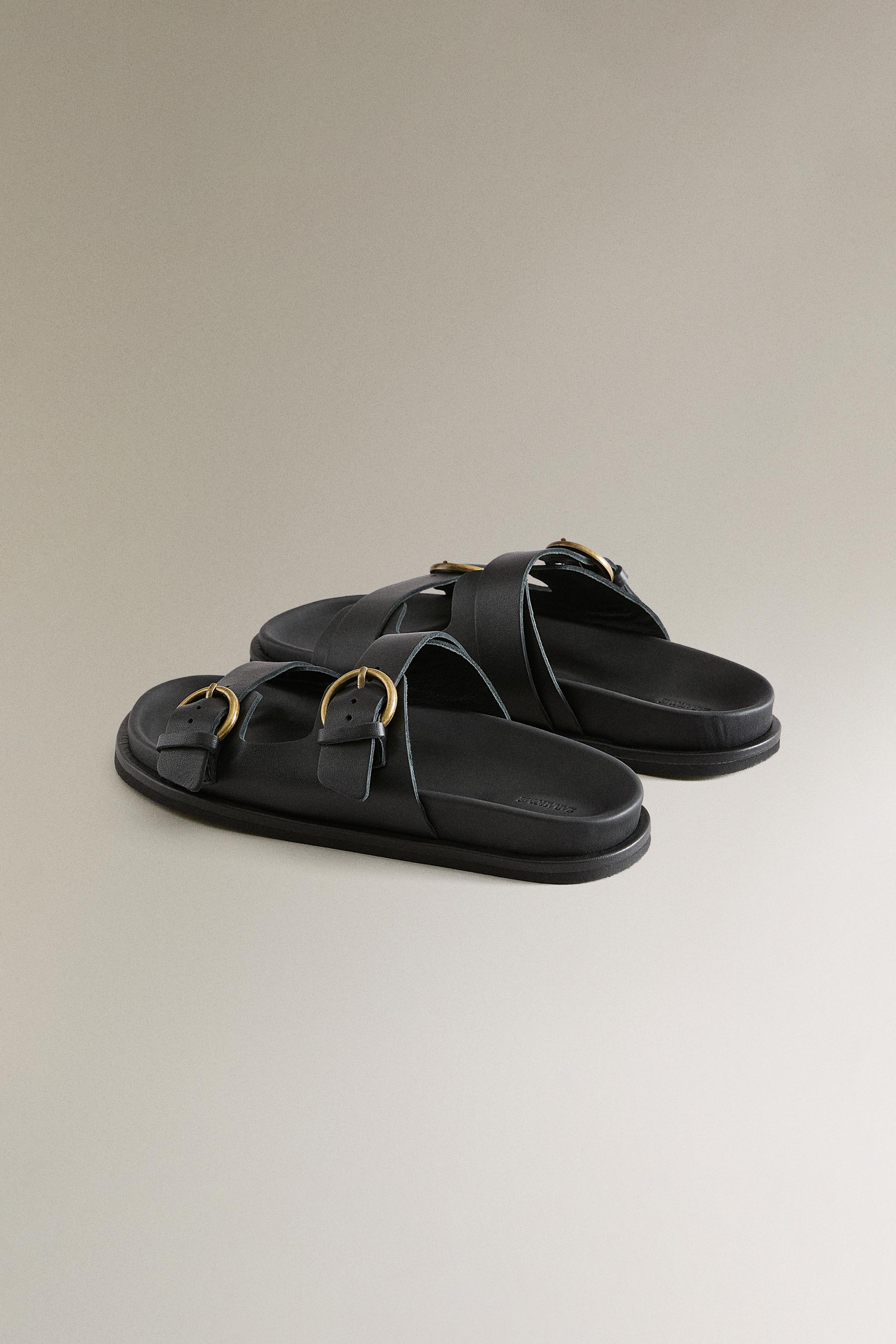 FLAT LEATHER SANDALS WITH BUCKLES