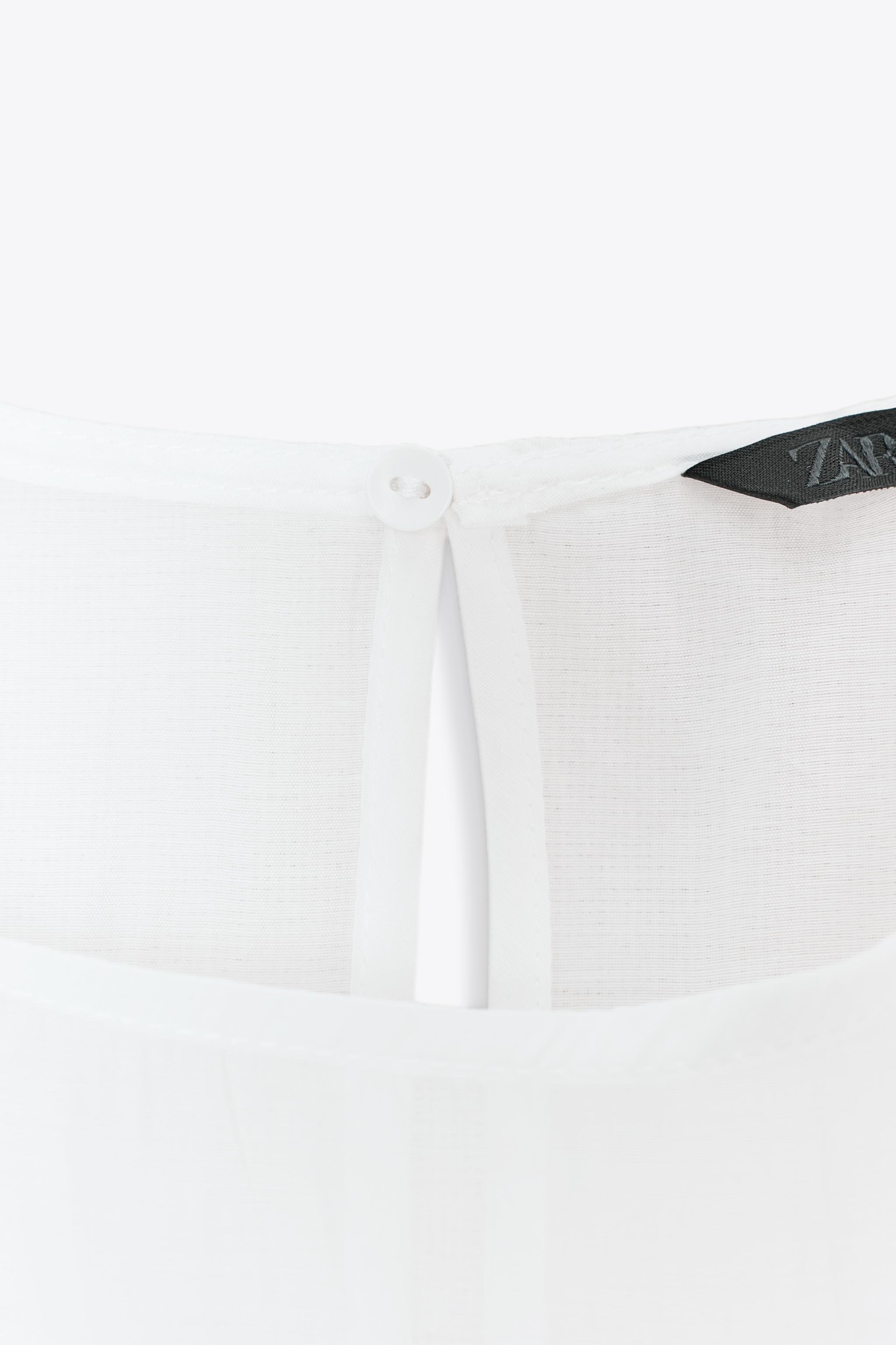 SEMI-SHEER RUFFLED BLOUSE