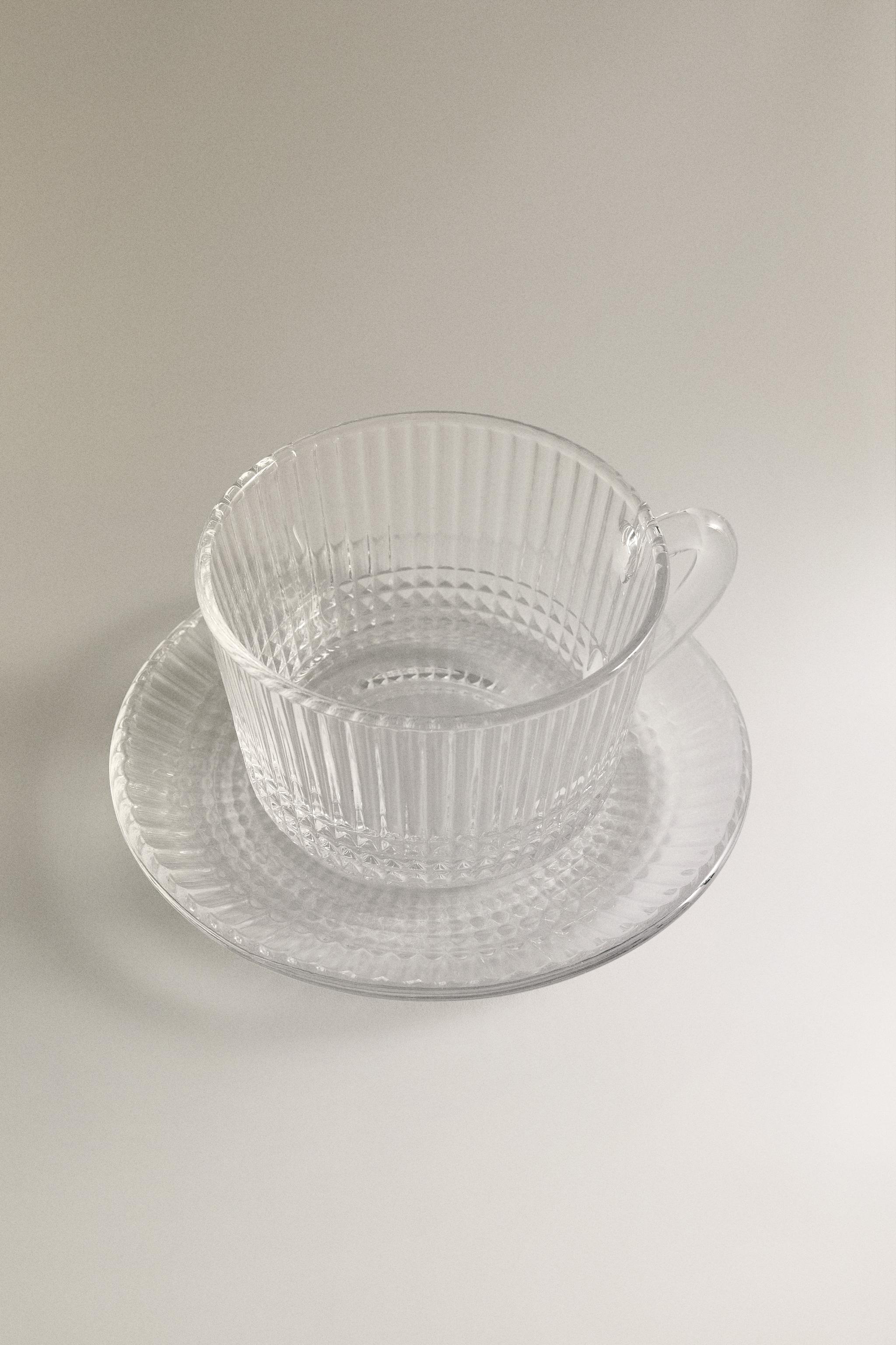 GLASS TEACUP WITH RAISED GEOMETRIC DESIGN