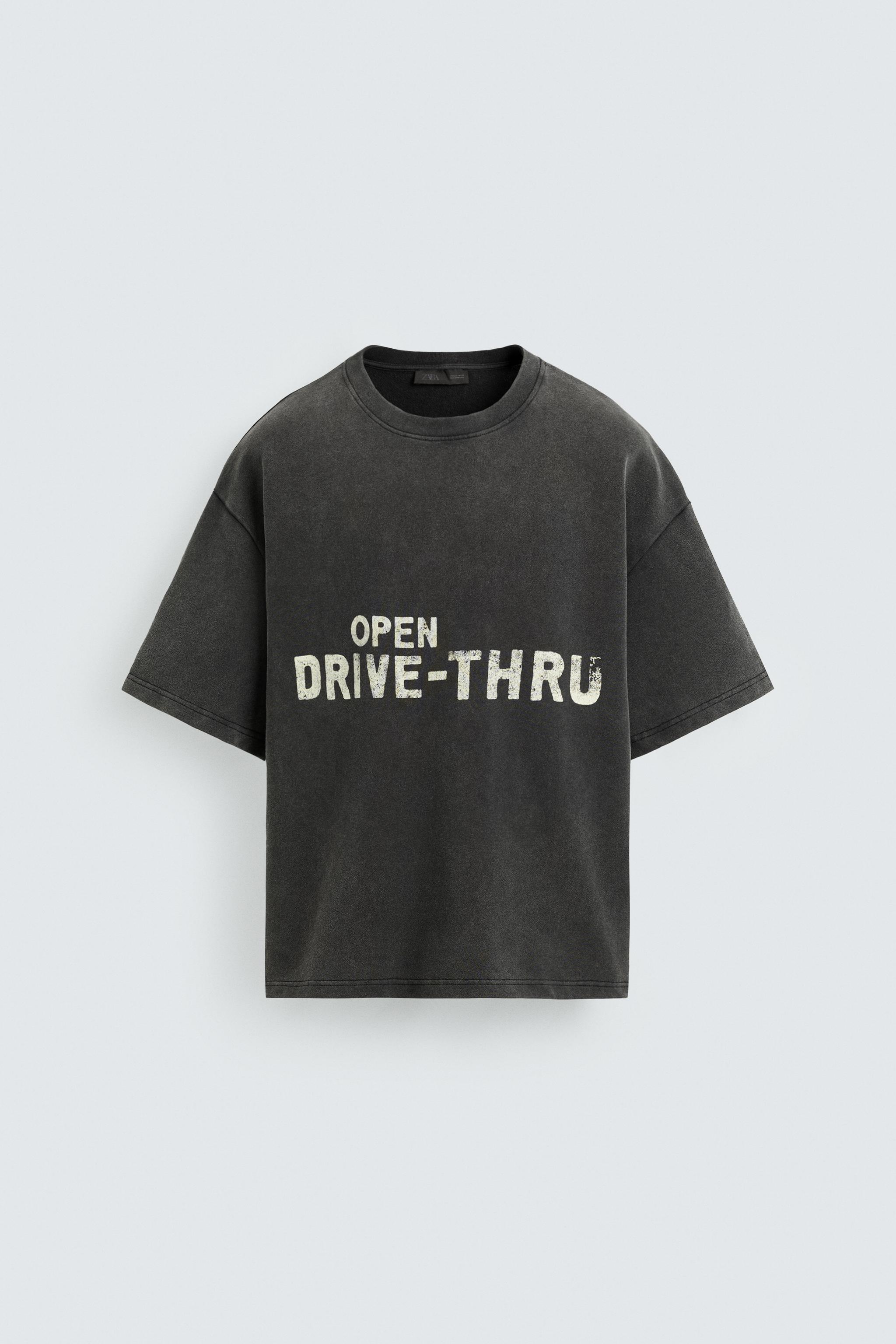 WASHED SWEATSHIRT WITH GRAPHIC PRINTS