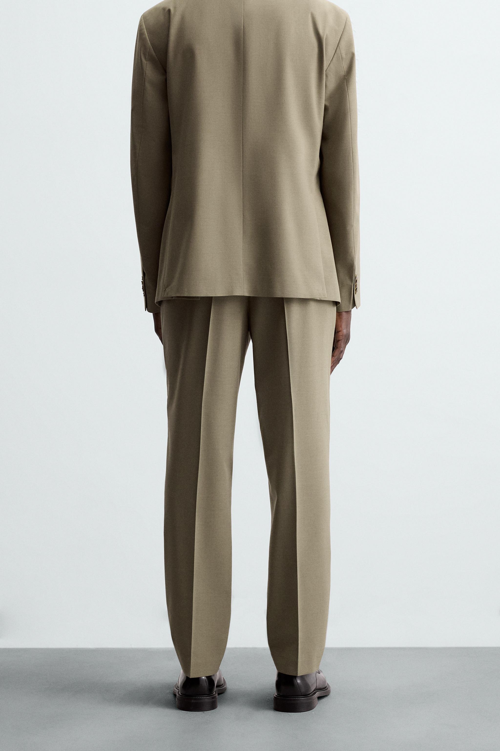 TEXTURED SUIT PANTS