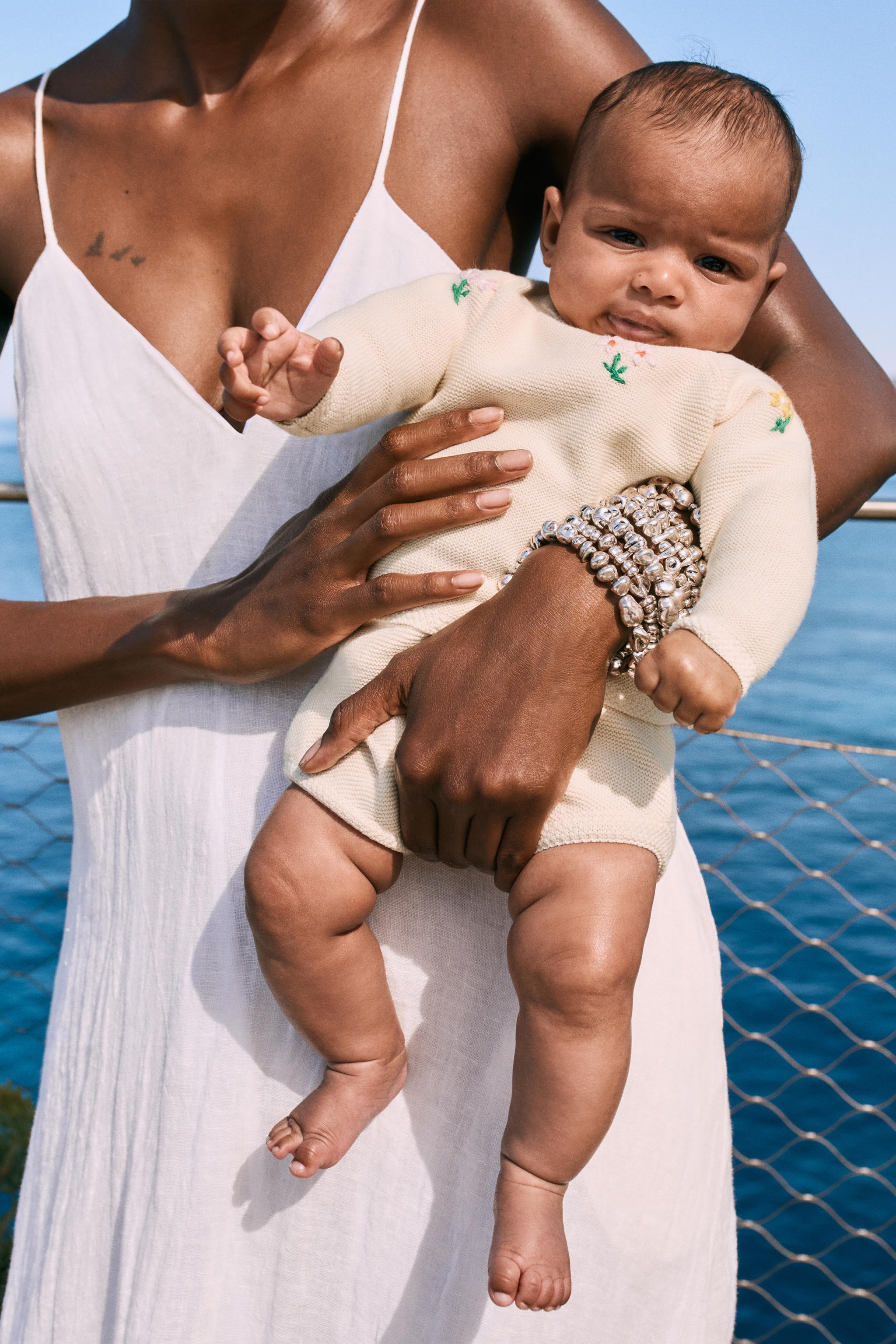 EMBROIDERED FLORAL LINKS KNIT SWEATER