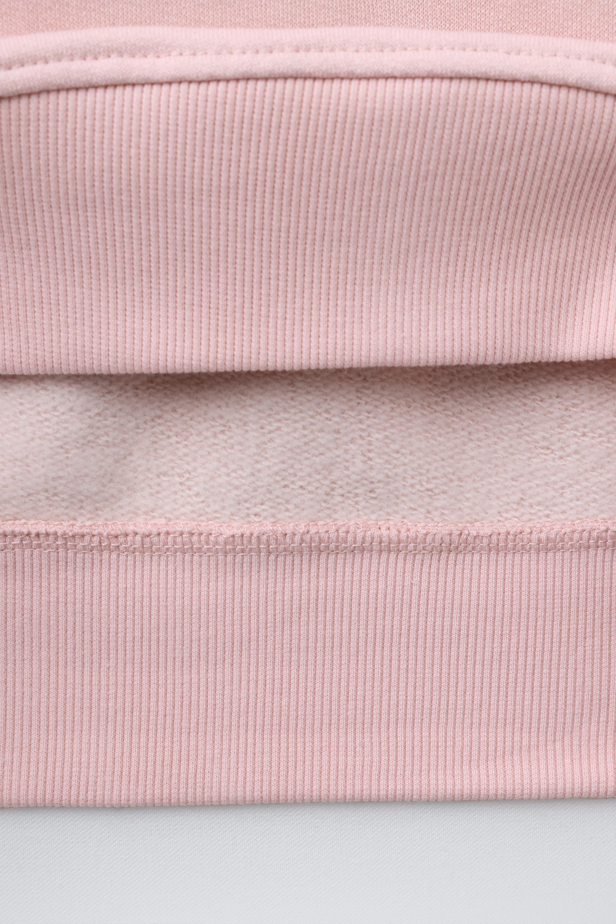 RAISED FLORAL SWEATSHIRT