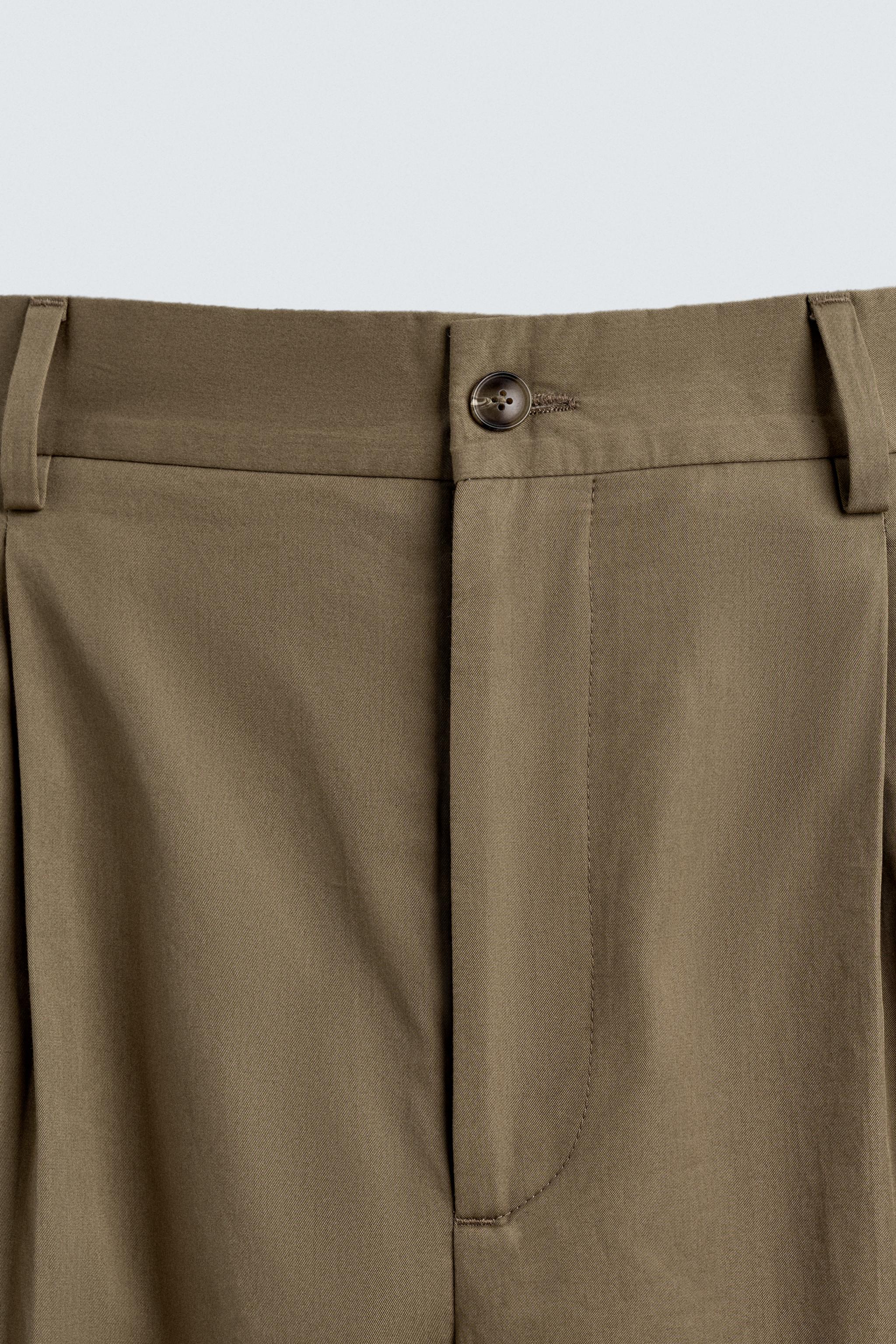 LIMITED EDITION RELAXED FIT PLEATED PANTS