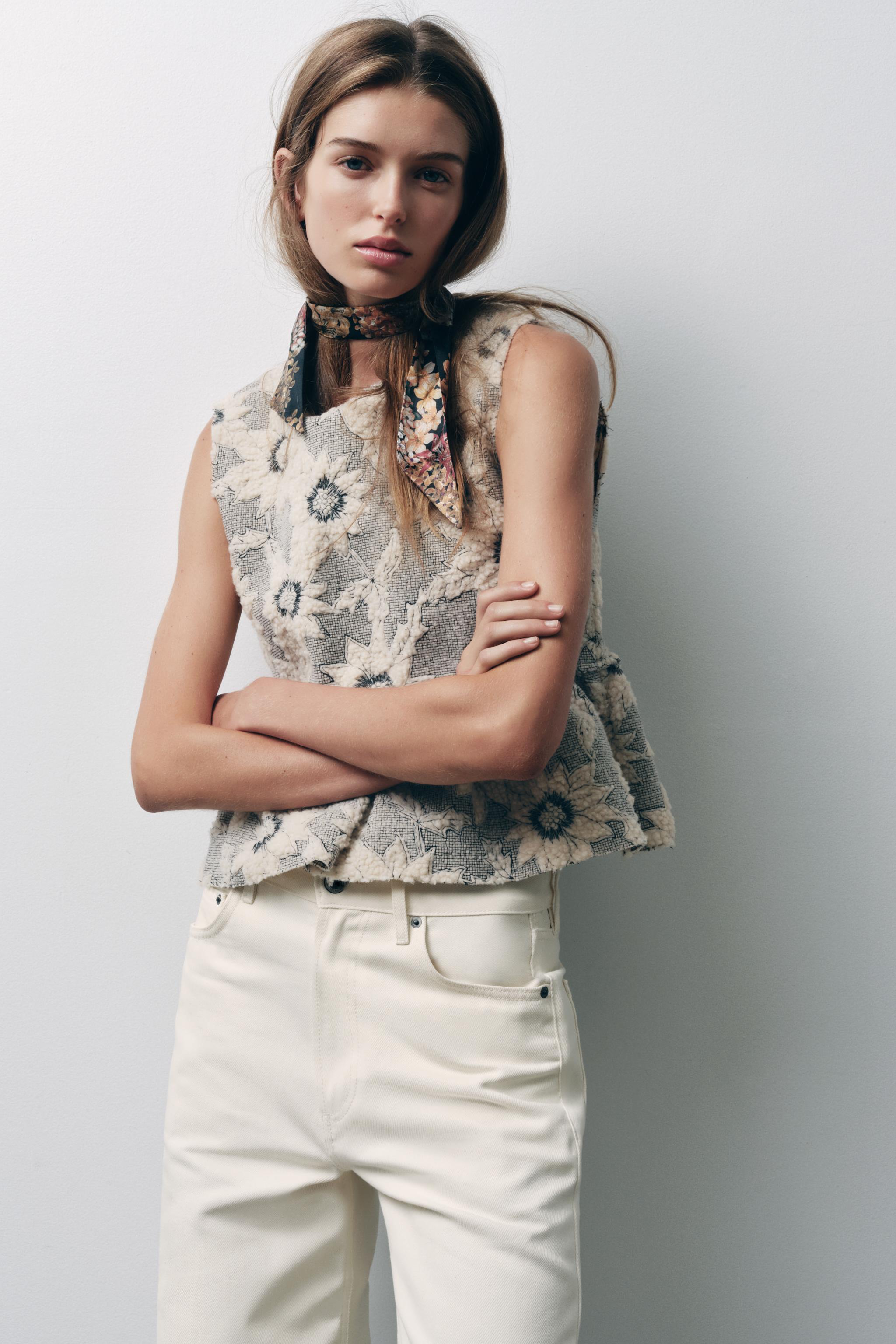 FLORAL TEXTURED KNIT PEPLUM TOP