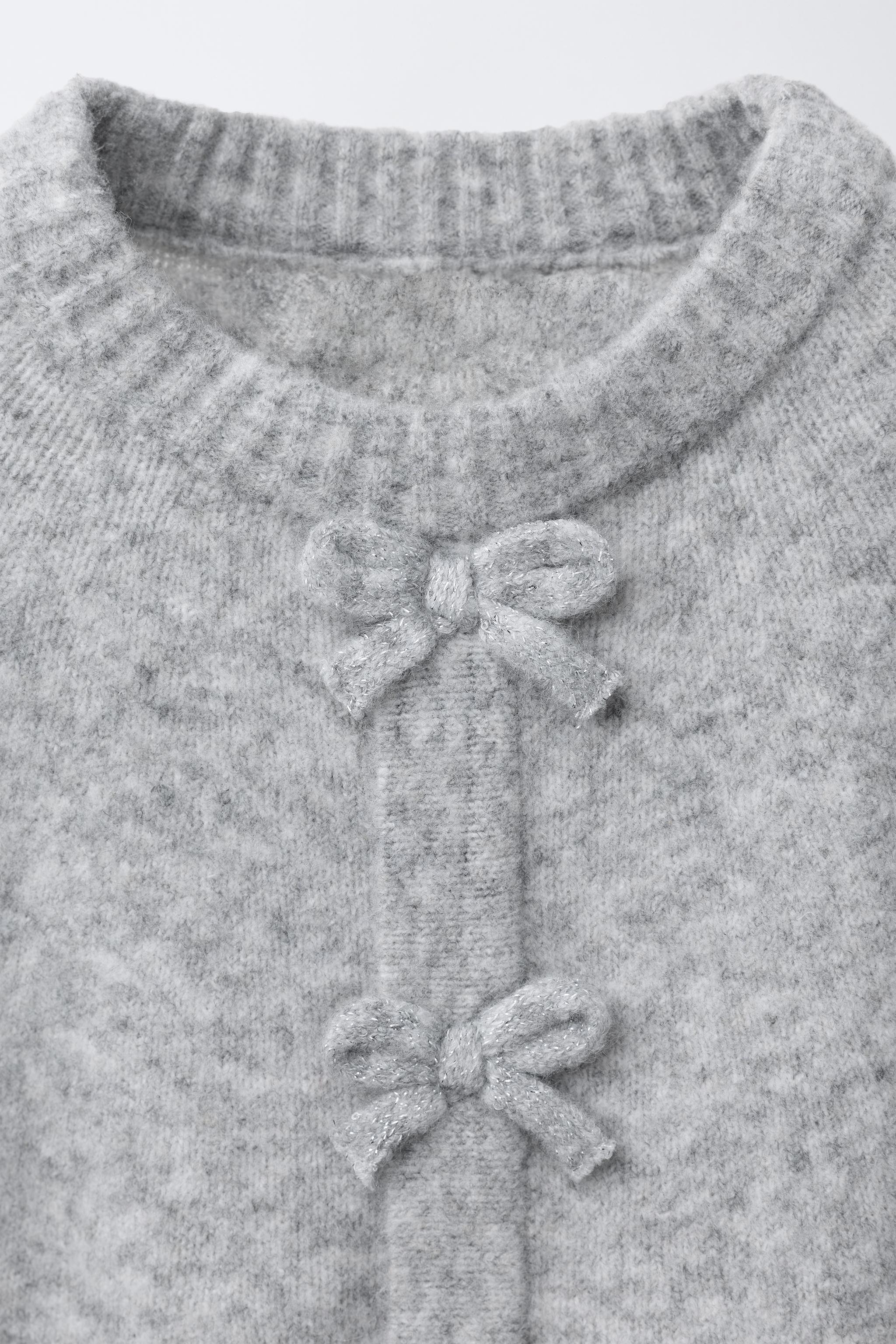 CAPE PONCHO WITH BOWS