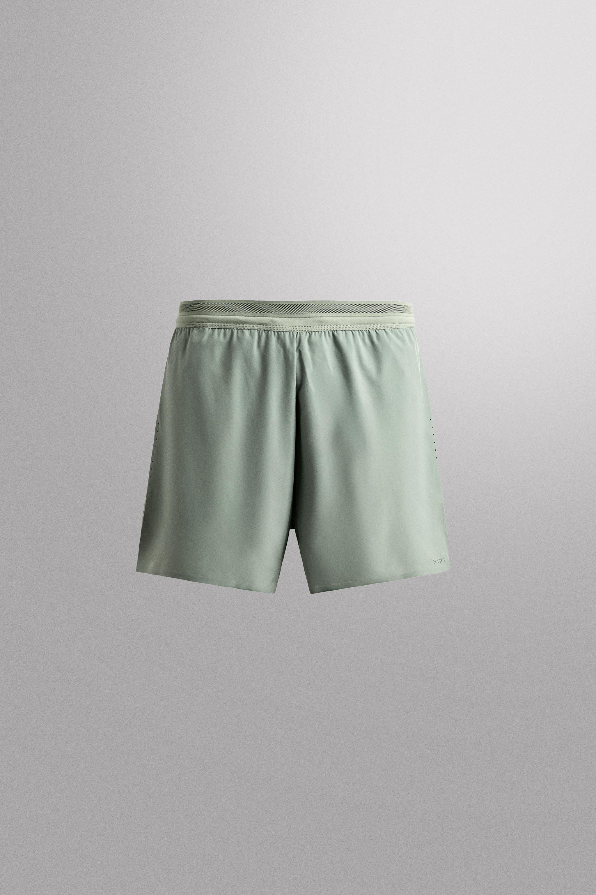 LIGHTWEIGHT PERFORATED SHORTS