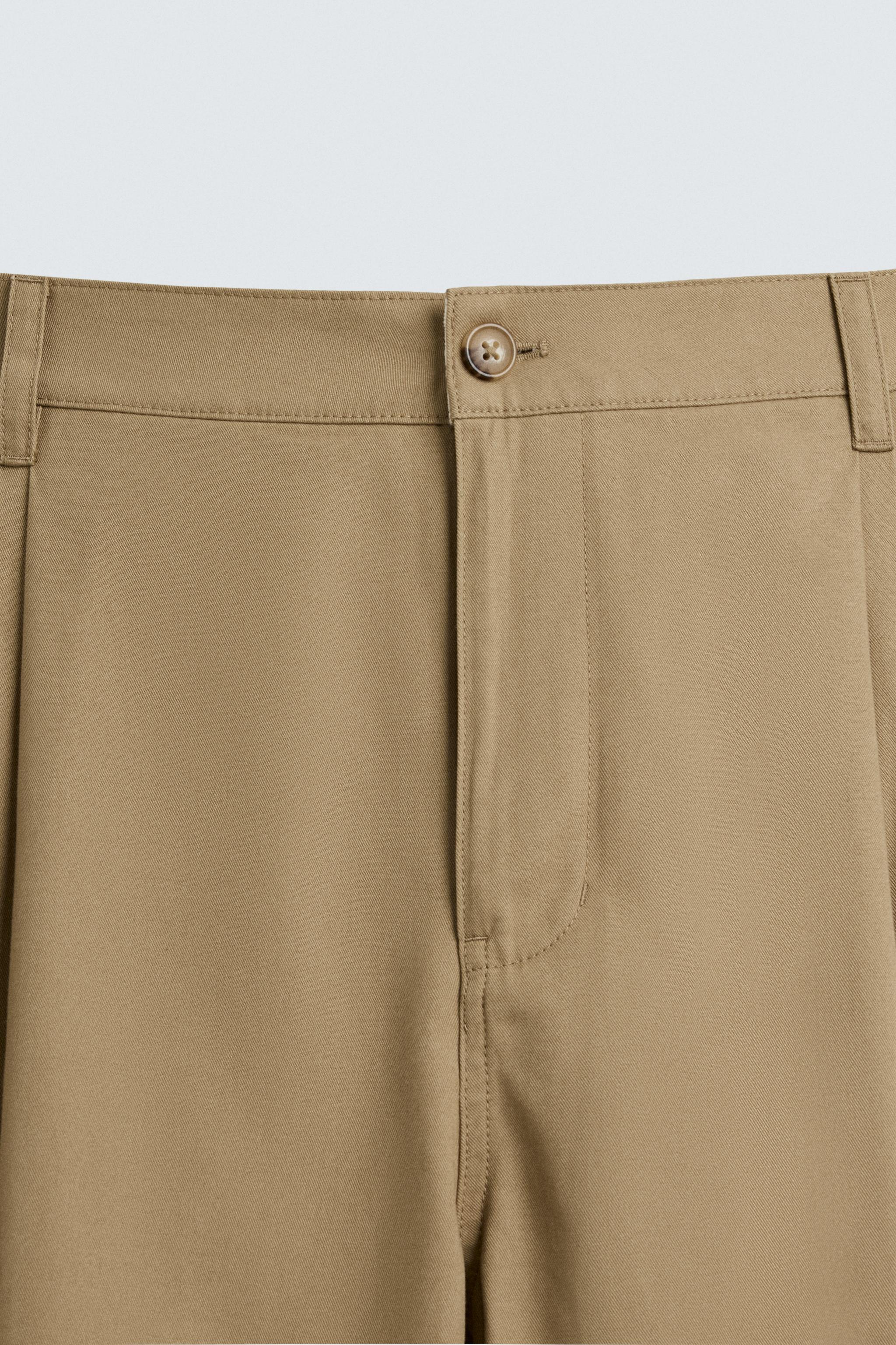 PLEATED WIDE FIT PANTS