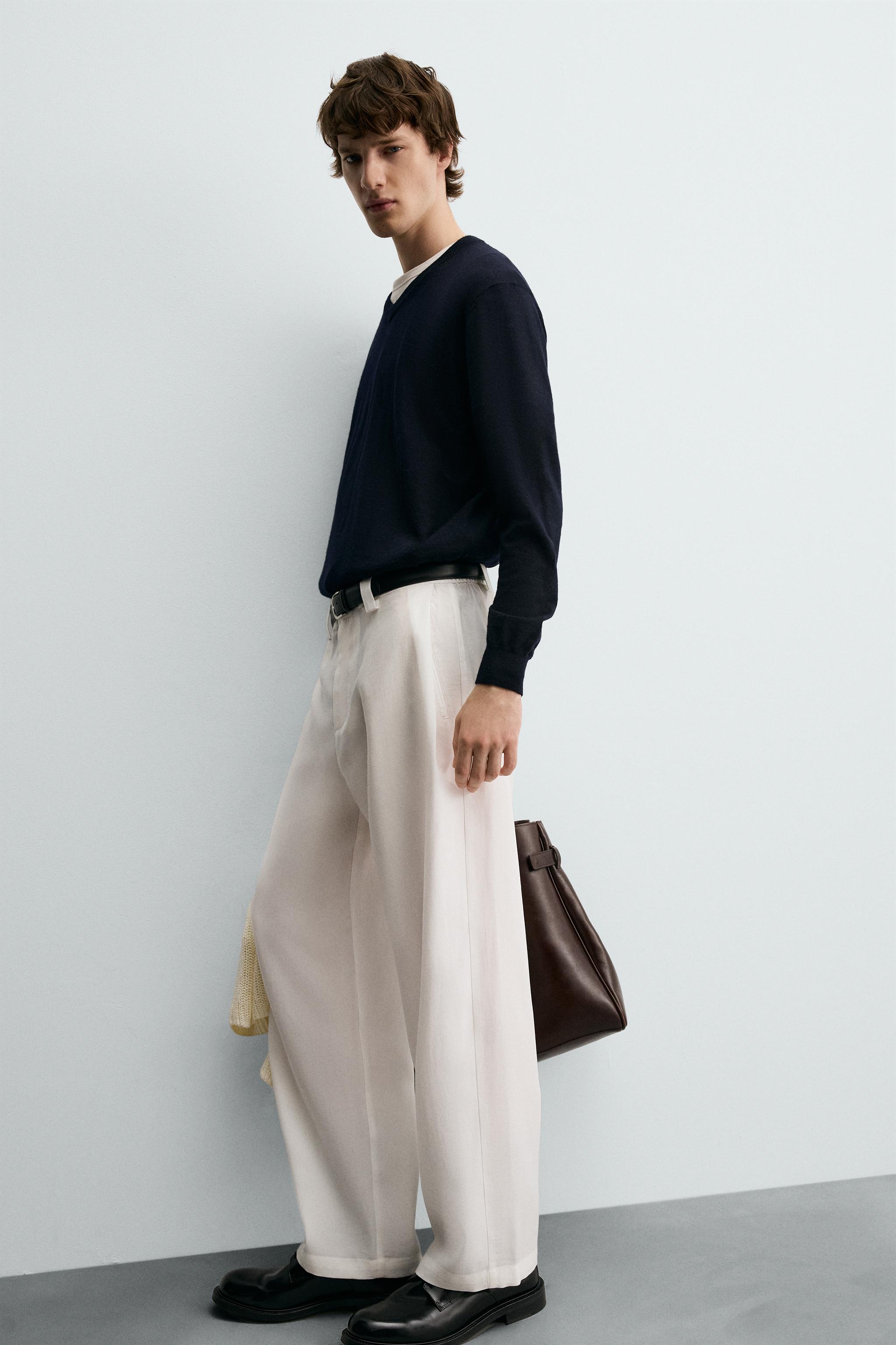 FLOWY PANTS WITH SIDE PLEATS