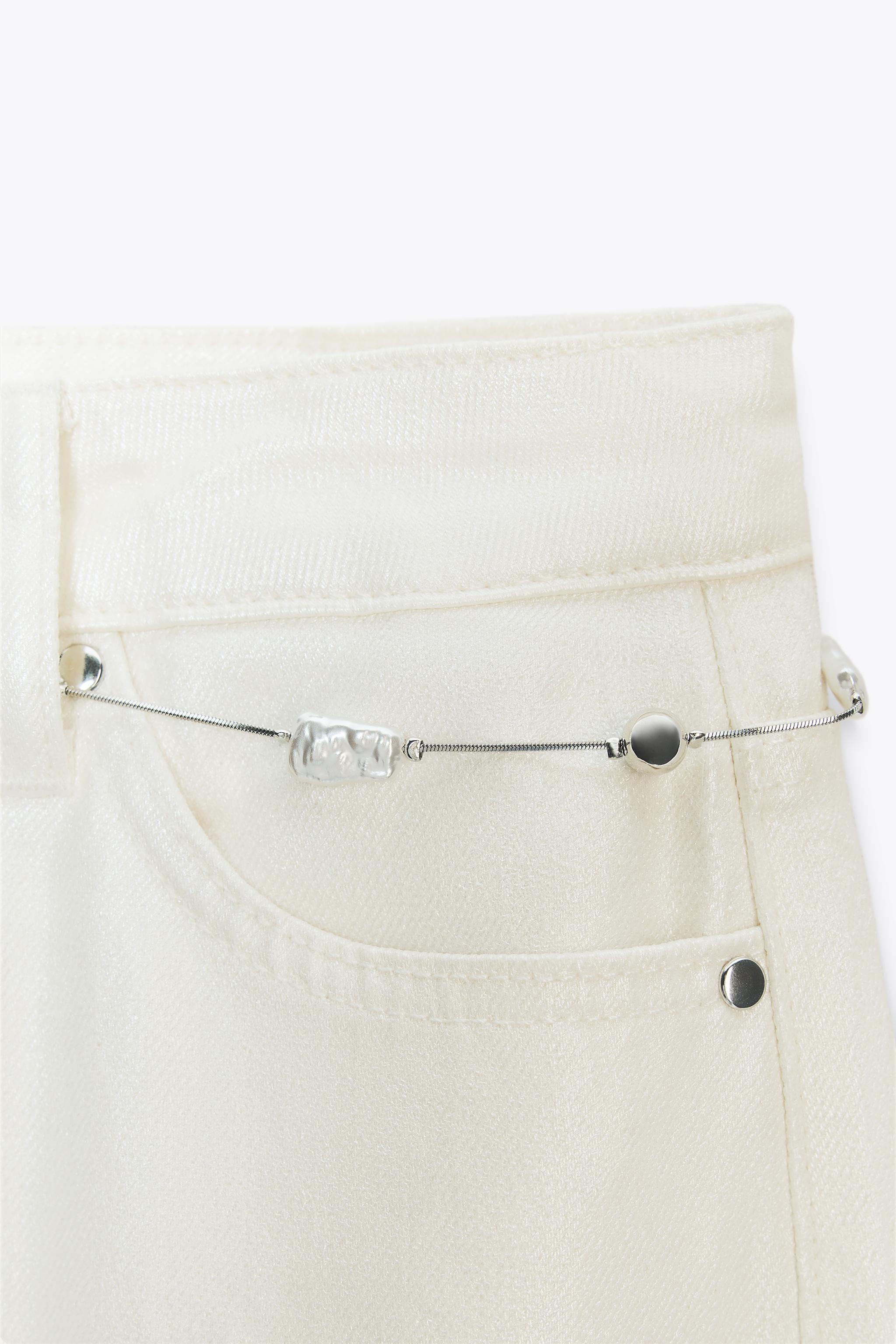 Z1975 PEARLESCENT BELTED JEANS