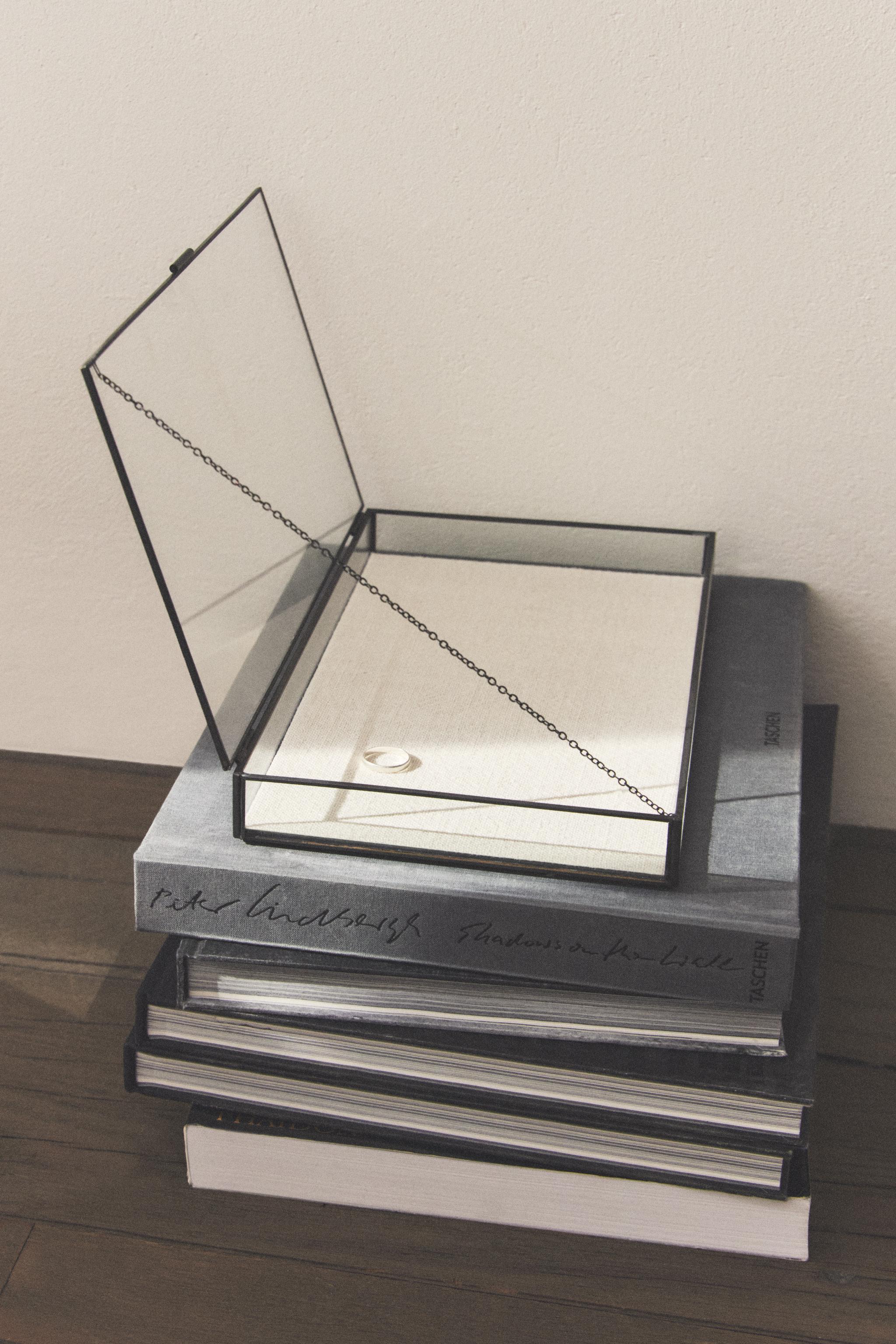 JEWELRY BOX WITH A BLACK METAL BORDER