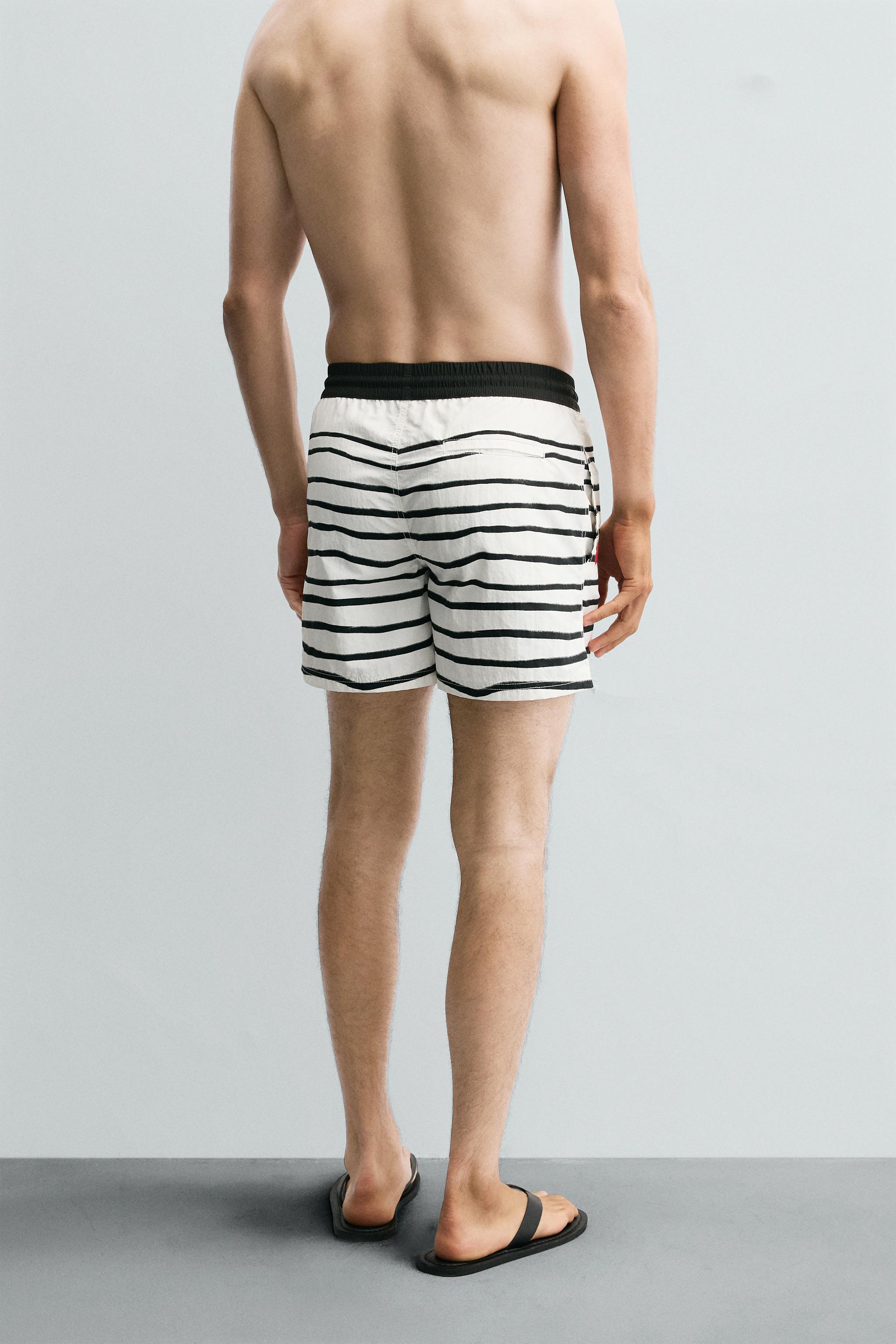 OTIS KWAME KYE QUAICOE PRINTED MID-LENGTH SWIMSUIT